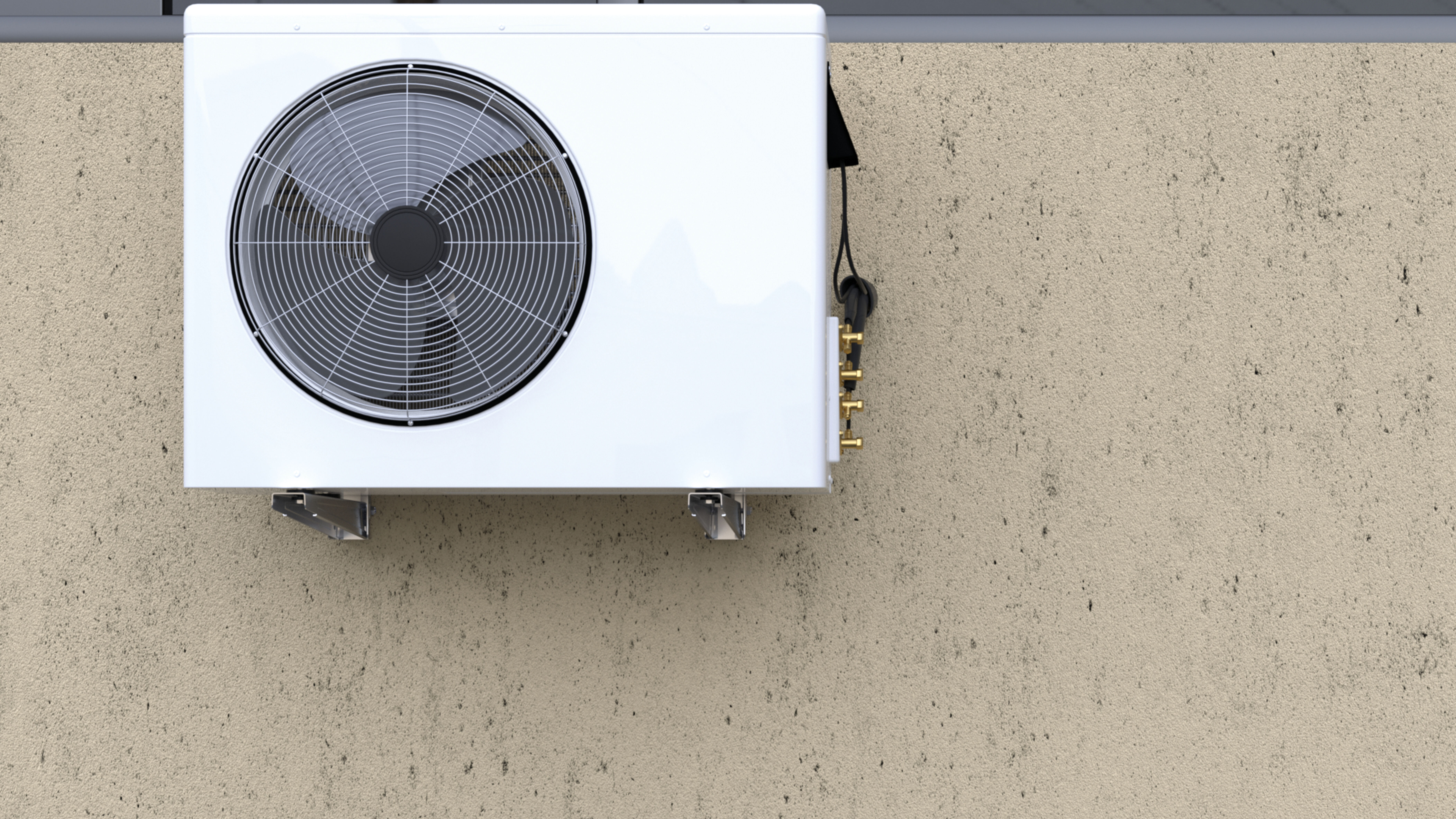 Biała jednostka klimatyzacji zamontowana na beżowej ścianie.
