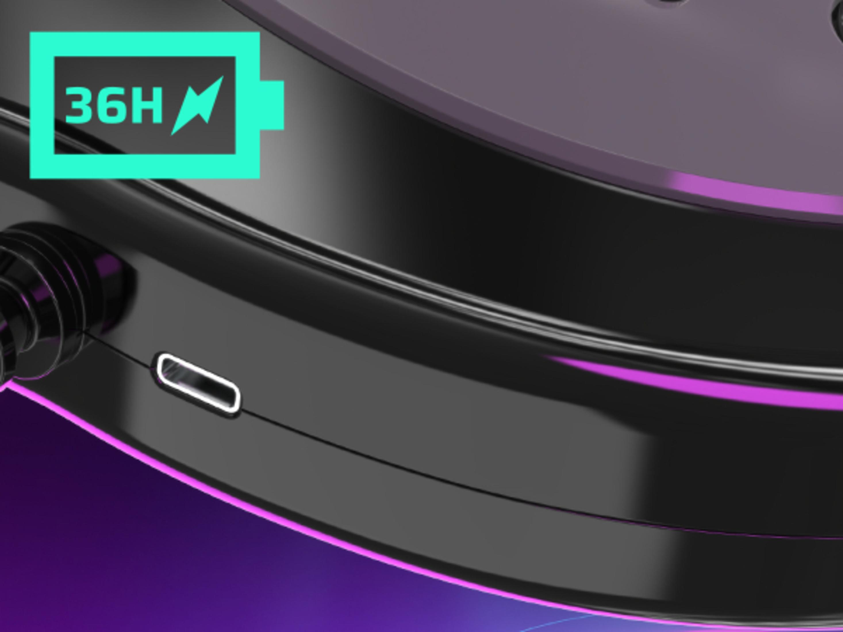 Zbliżenie czarnego smartwatcha ze wskaźnikiem ładowania i portem ładowania.