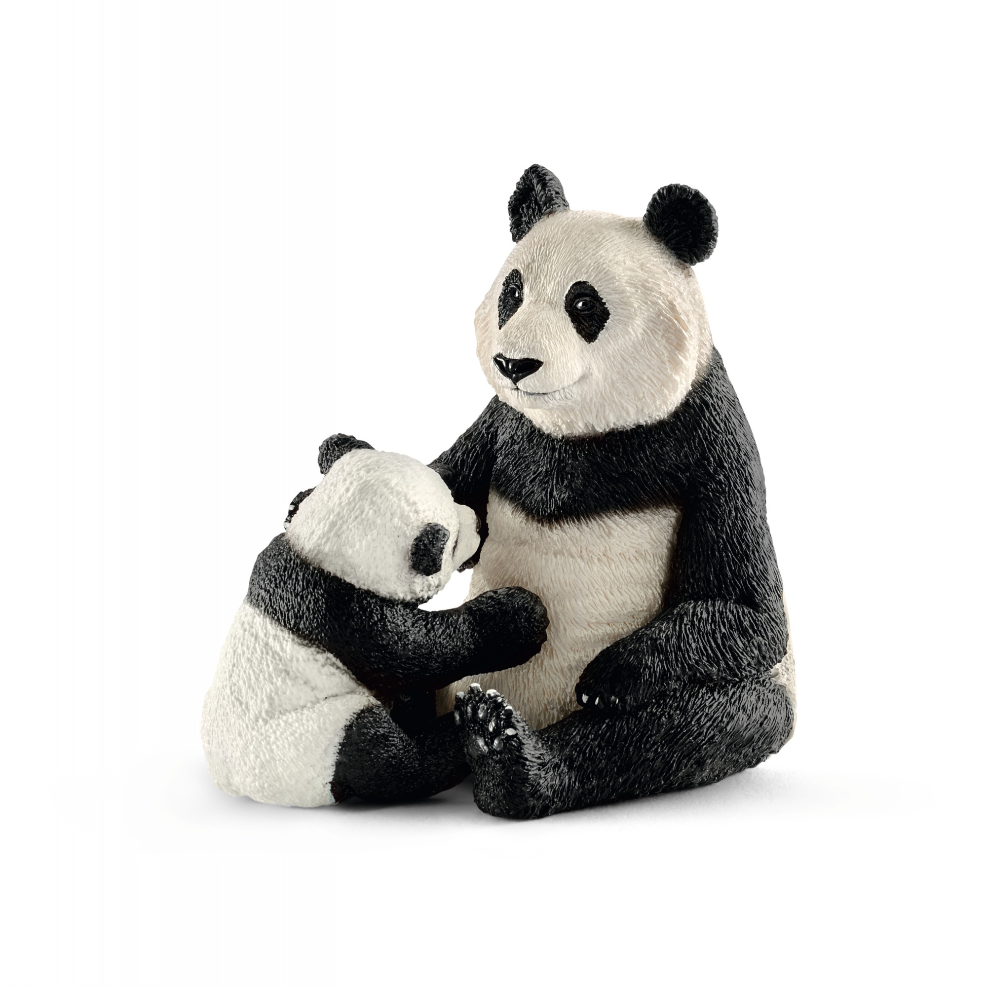 Due figurine di panda, un adulto e un cucciolo, seduti fianco a fianco.