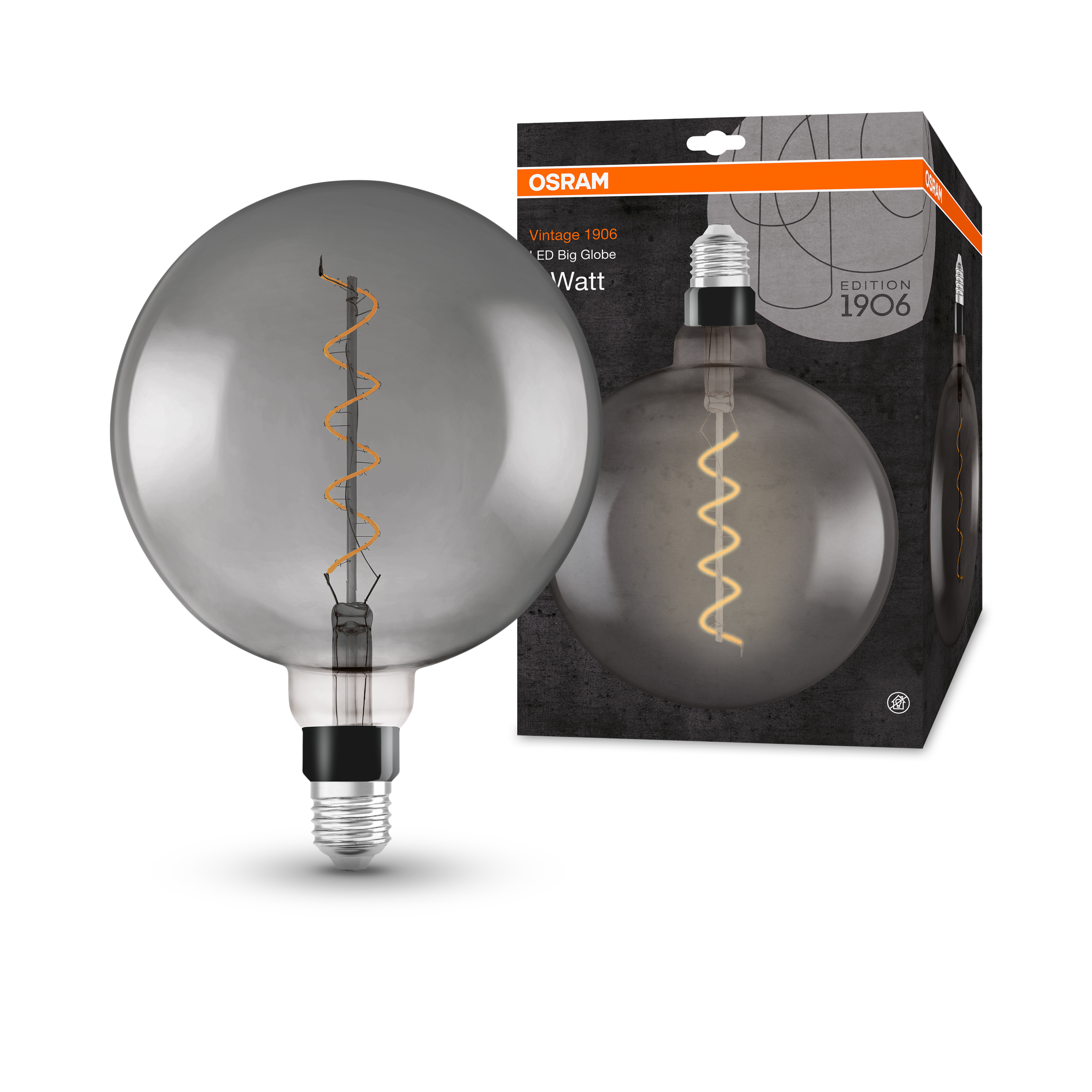 Una lampadina grigia, rotonda, in stile vintage davanti alla sua scatola nera e arancione su bianco.