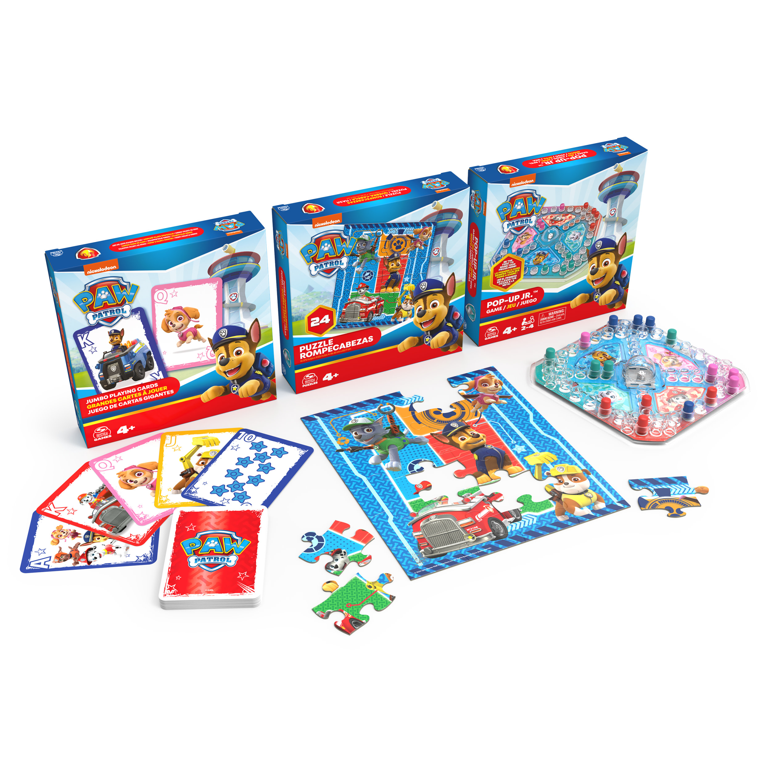 Drie Paw Patrol puzzel- en speldozen met een cartoonhondenkarakter.
