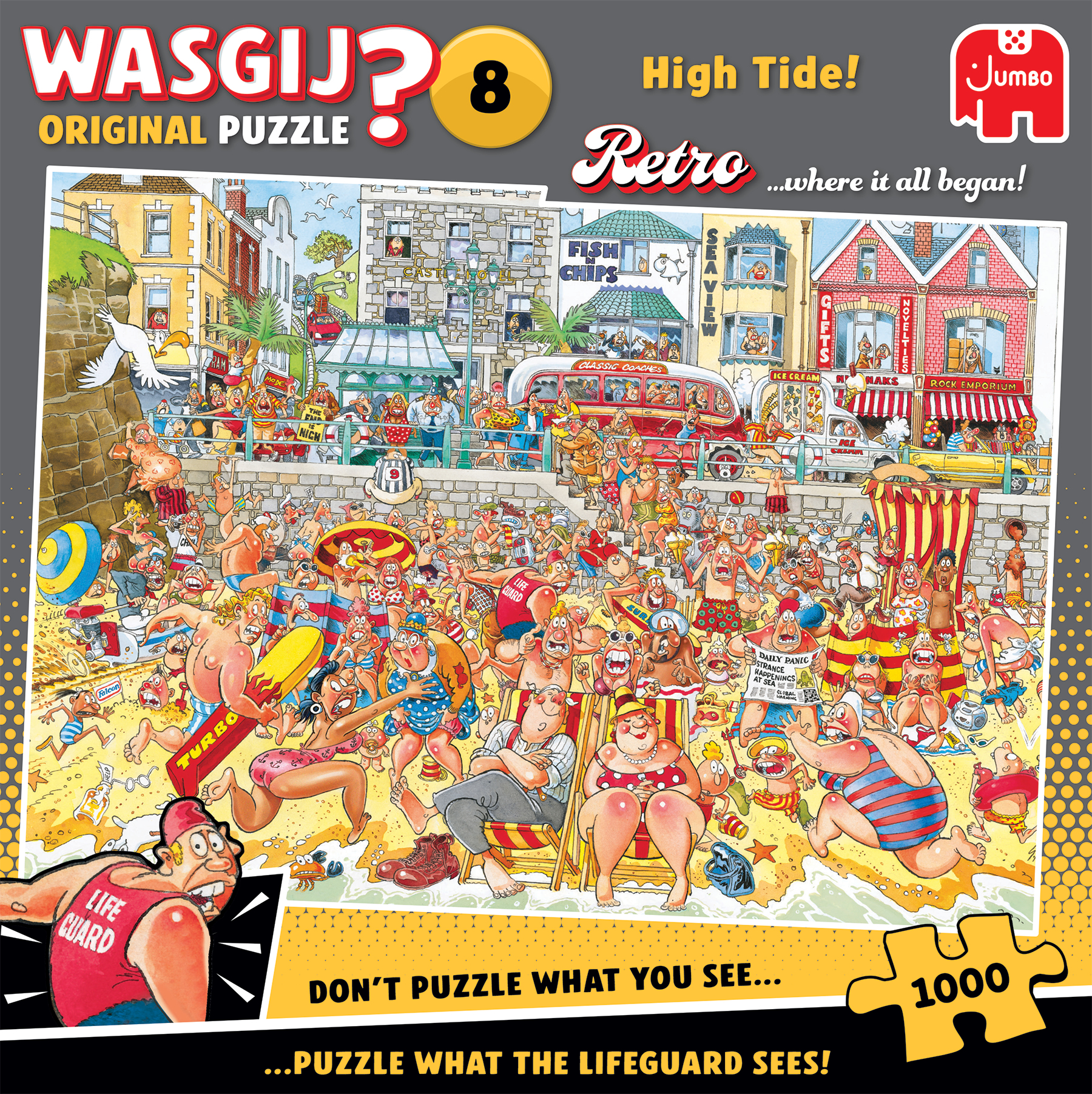 Een Wasgij? puzzelbox met een strandscène vol mensen, een bus en winkels.