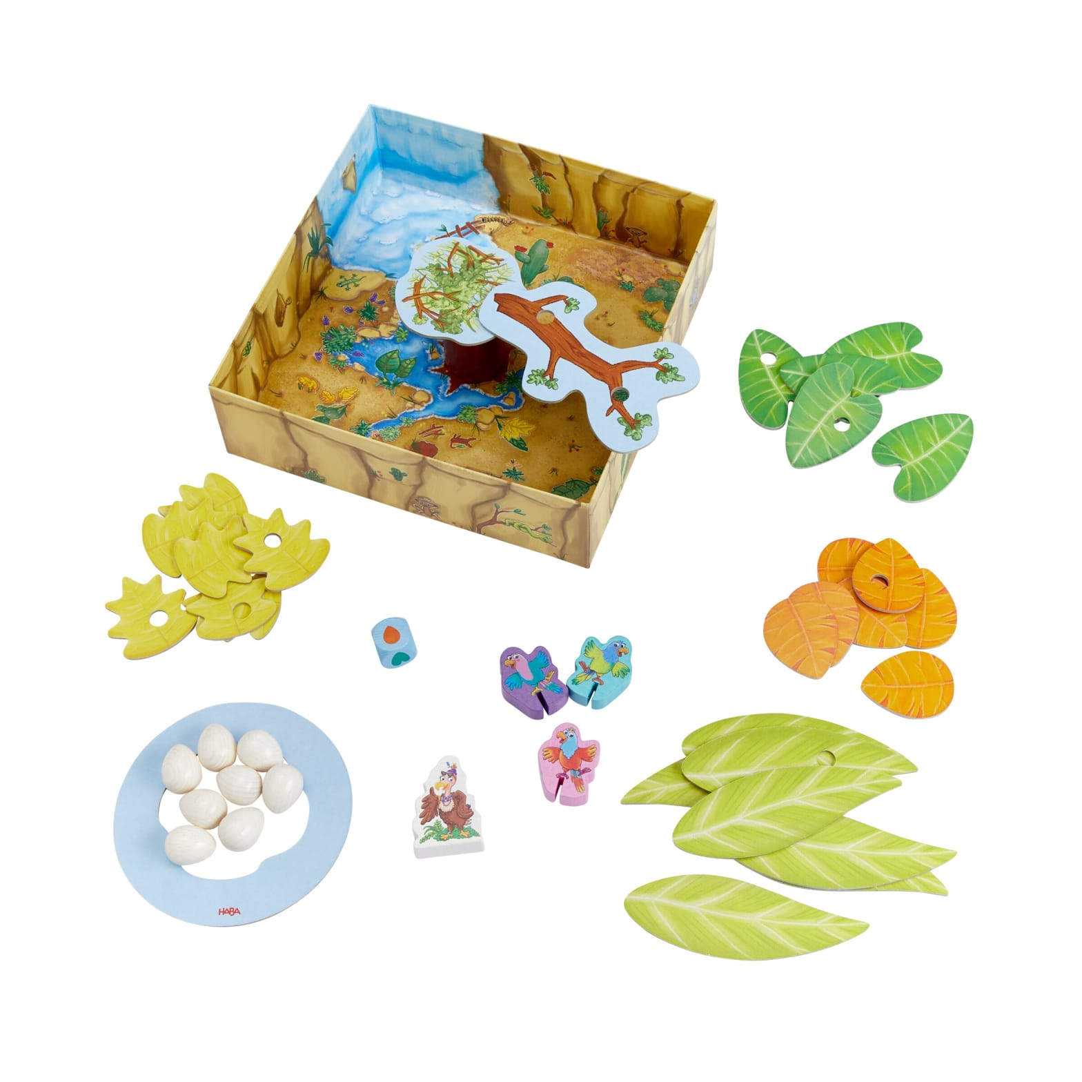 Jeu pour enfants avec une boîte et diverses pièces de jeu en bois : œufs, feuilles, figurines.