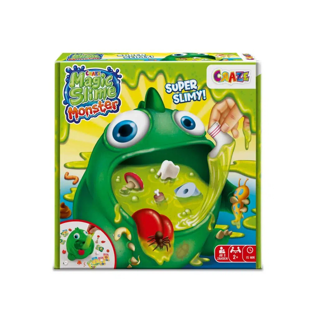 Une boîte Magic Slime Monster montrant un monstre vert avec de la slime et divers objets sur fond blanc.