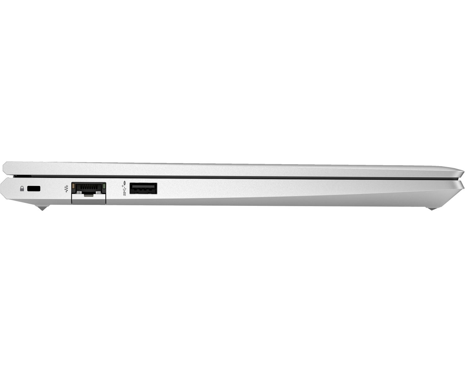 Vista laterale di un laptop argentato chiuso. Porte USB e altre sono visibili.