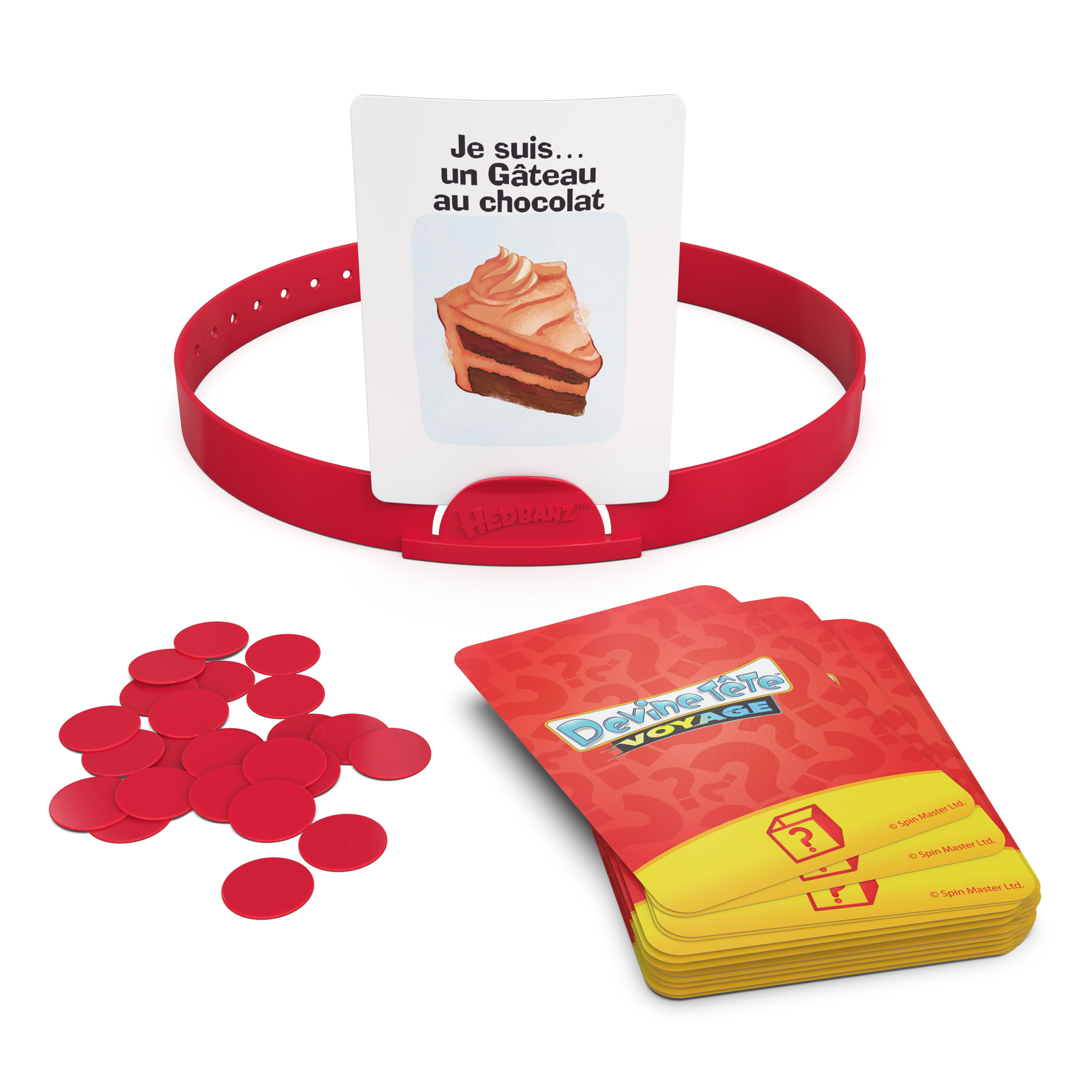 Spiel mit Karten und Stirnband. Die Karte sagt: „Ich bin... ein Schokoladenkuchen.“ Rote Spielsteine sind verstreut.