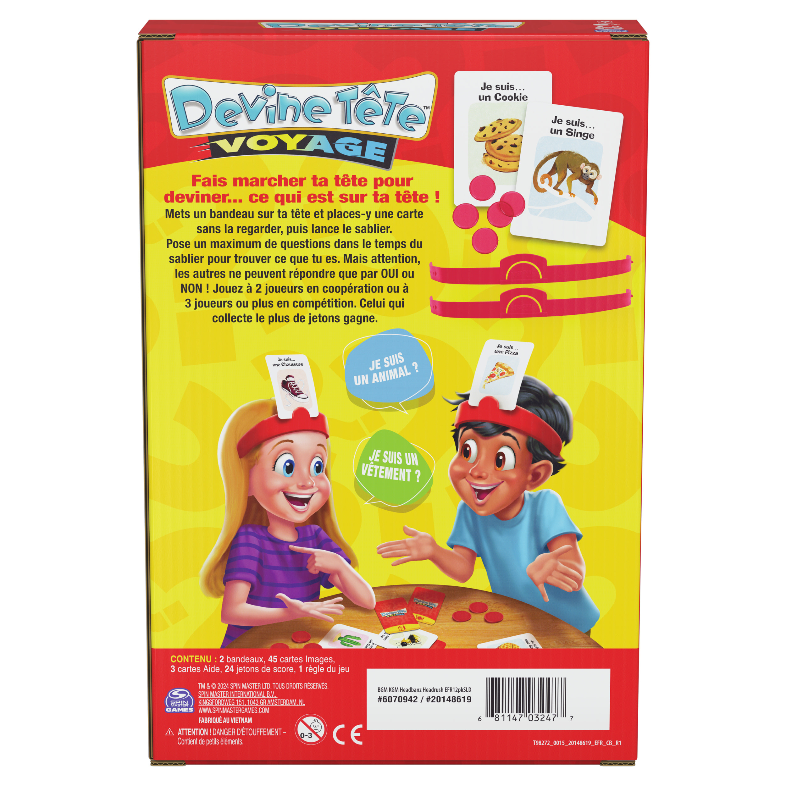 Brettspielbox und laufendes Spiel. Zwei Kinder spielen mit Stirnbändern und Karten.