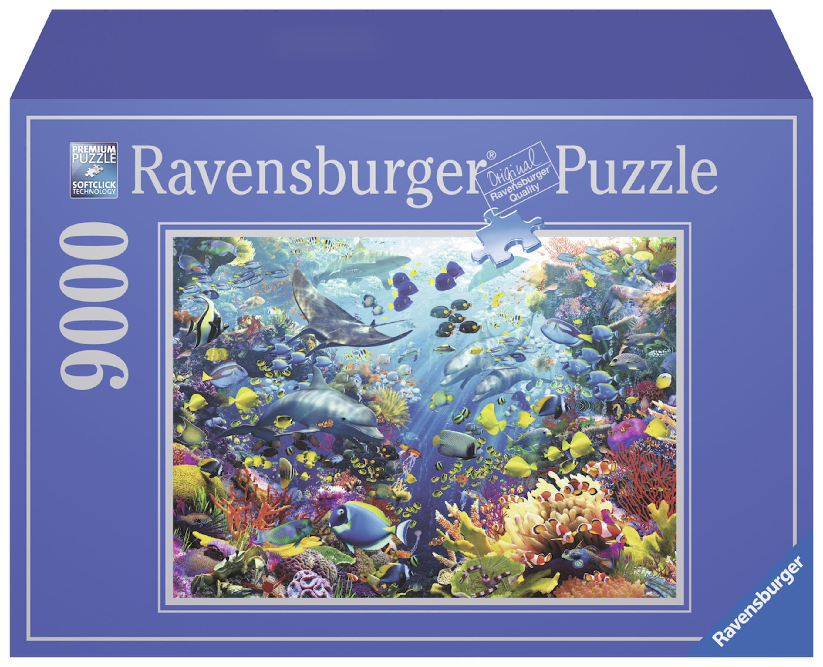 Scatola puzzle Ravensburger, scena subacquea con molti pesci colorati, delfini e una manta.