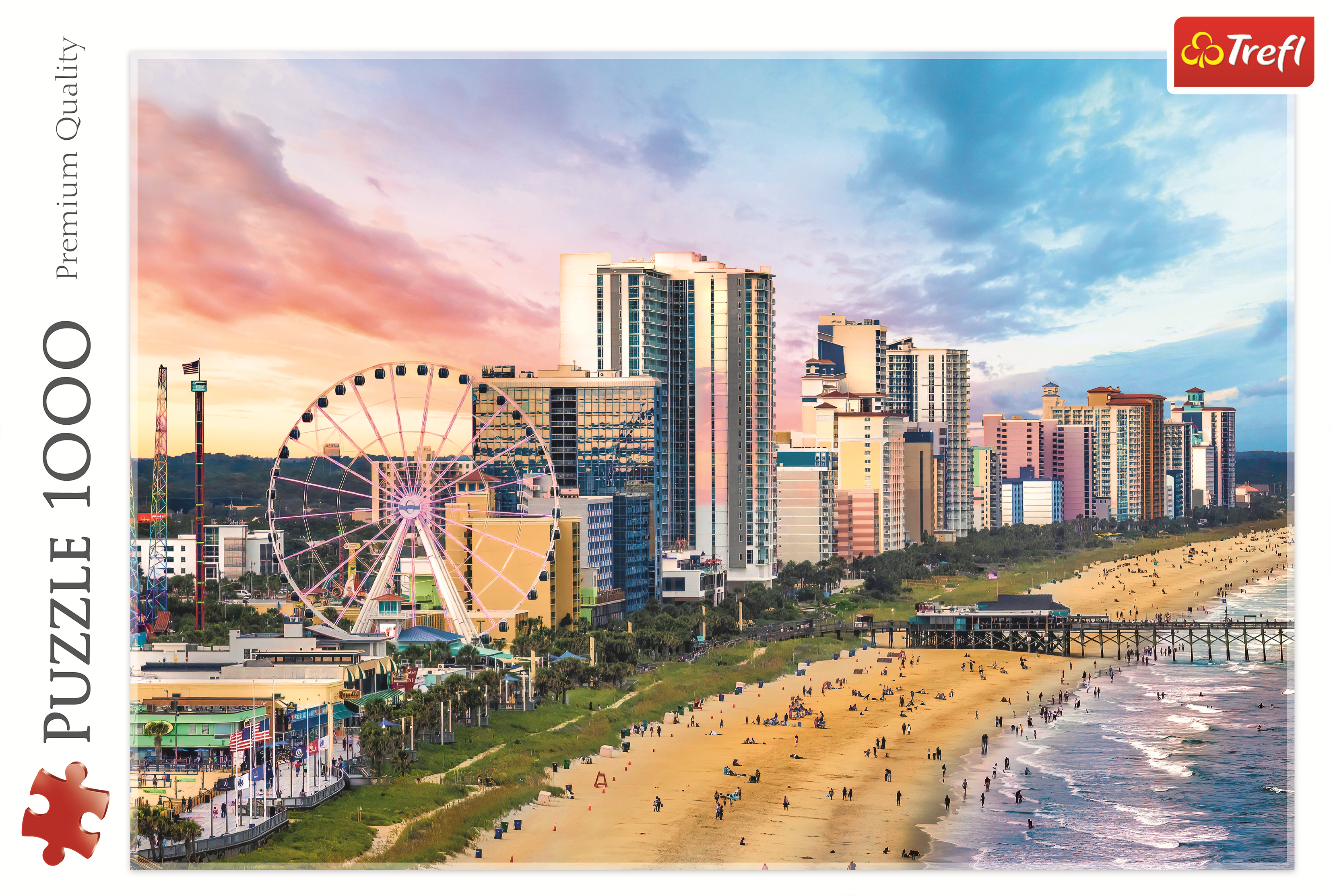 Un puzzle di una scena sulla spiaggia. Una ruota panoramica e degli edifici sono visibili. Il cielo è colorato. Bordo bianco.