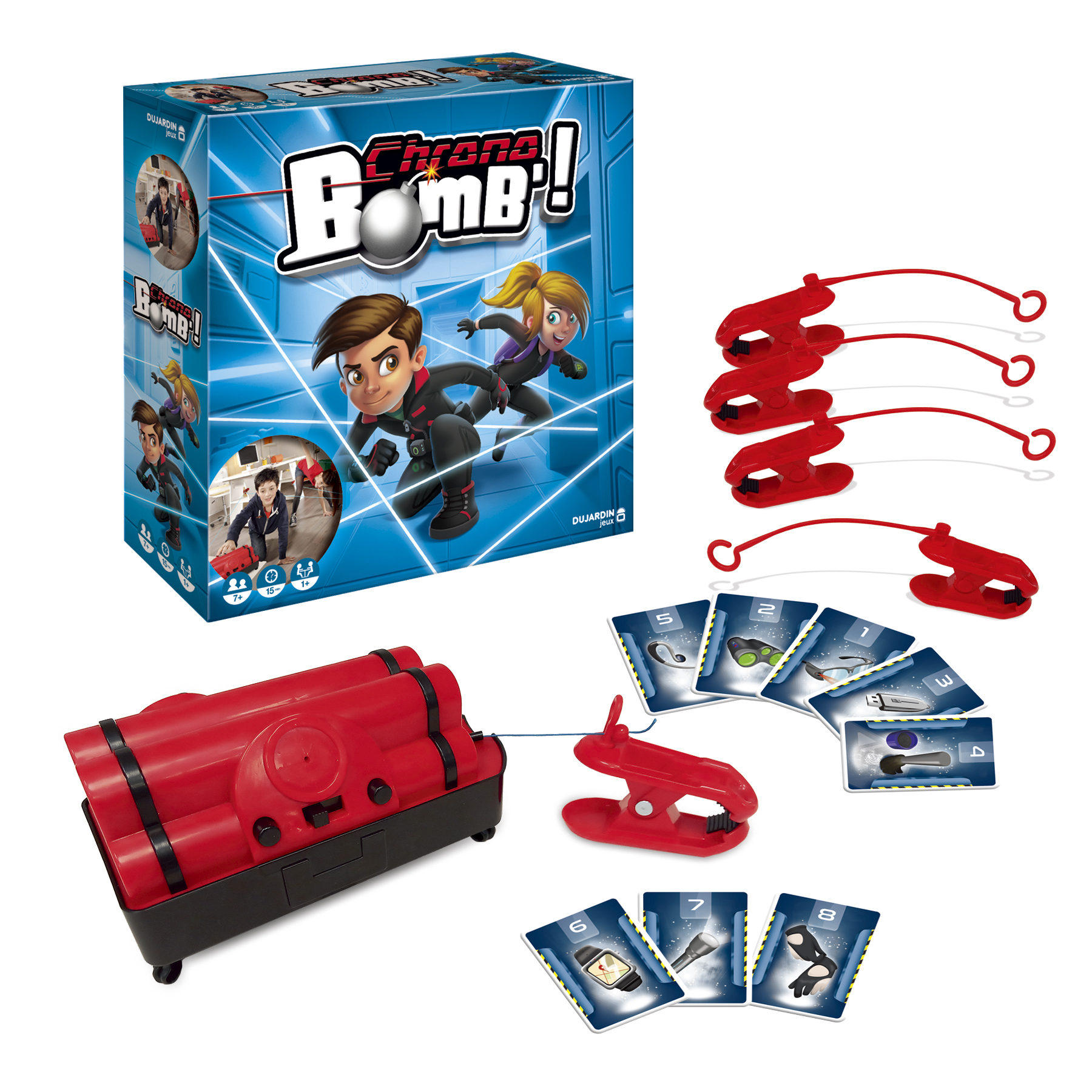 Scatola del gioco da tavolo, bomba rossa, detonatori giocattolo e carte con numeri e simboli visibili.