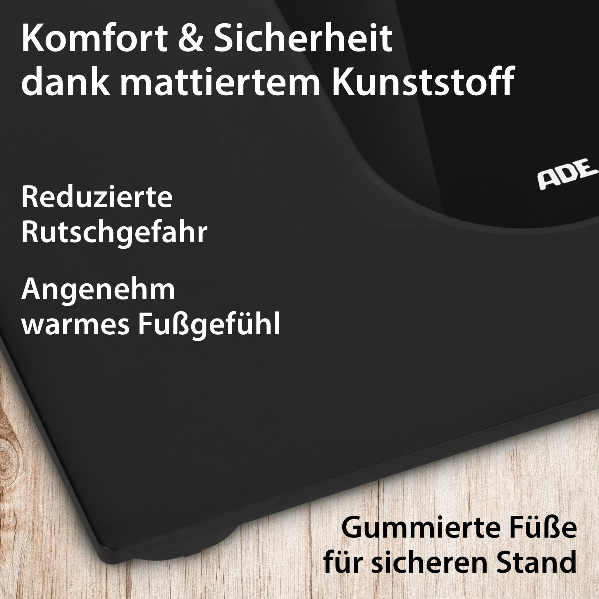 Zbliżenie czarnej wagi łazienkowej z tekstem o komforcie i bezpieczeństwie.