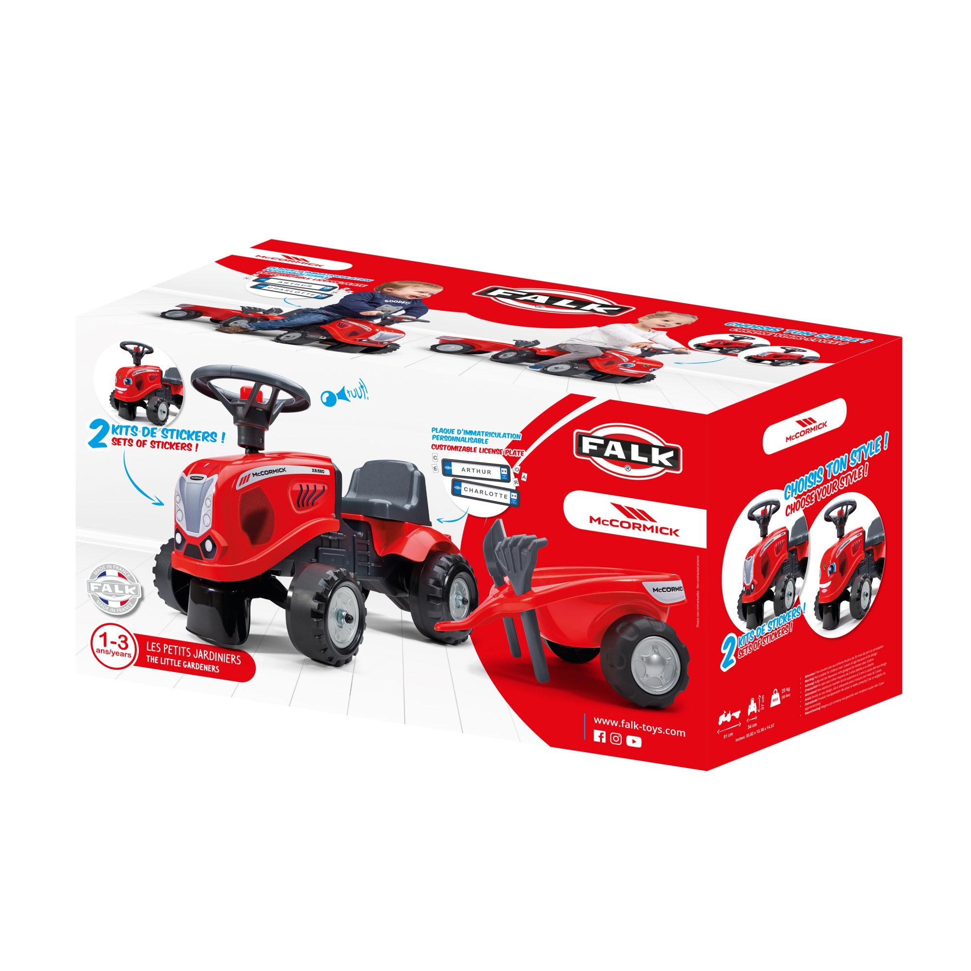Tractor de juguete rojo con remolque, mostrado en una caja con otras imágenes de tractores.