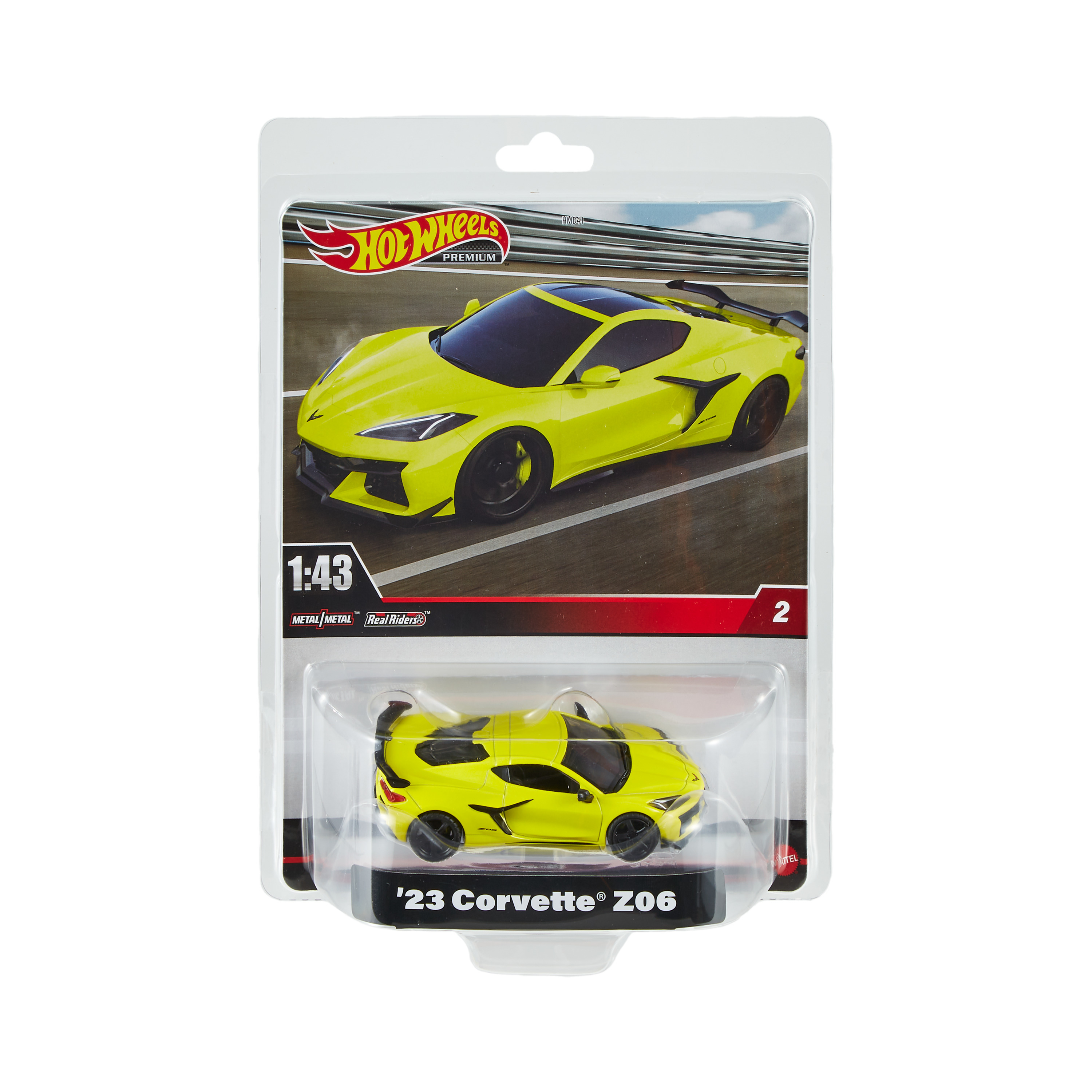 Gelbes Corvette-Spielzeugauto in einer Kunststoffhülle mit schwarzer Basis.