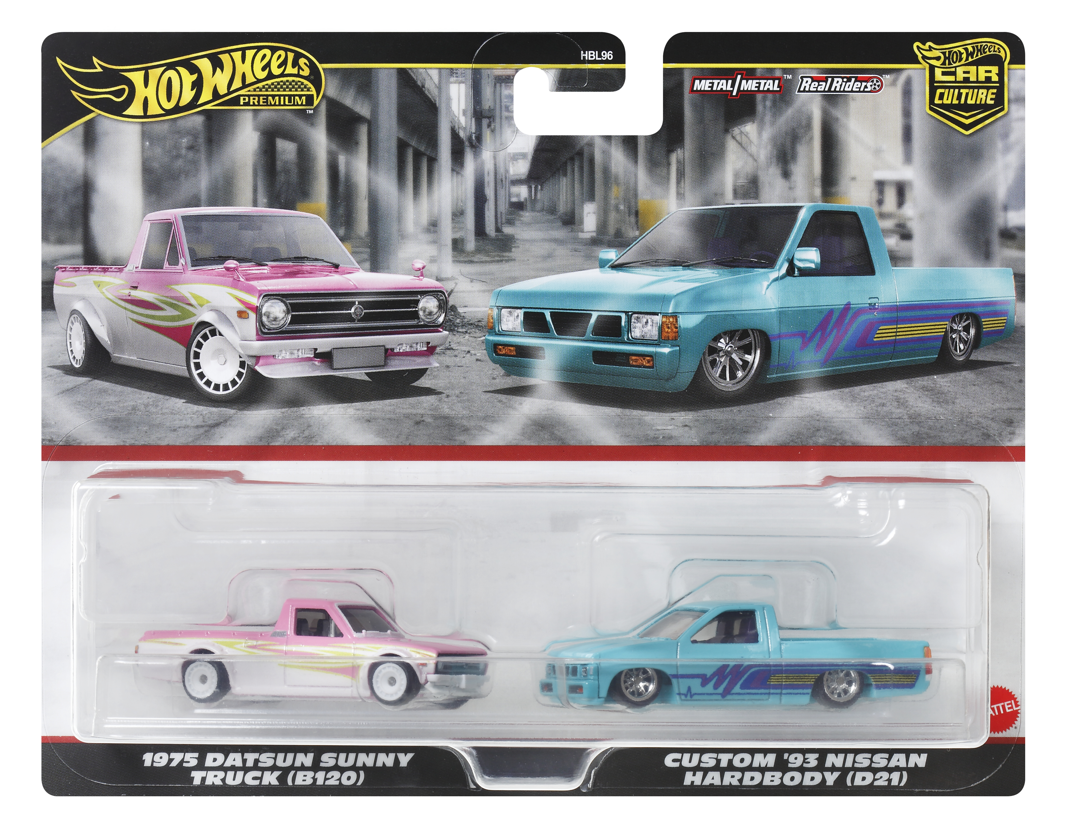 Zwei Hot Wheels Spielzeugautos, eines rosa, eines blau. Beide sind Pick-up-Trucks. Die Verpackung zeigt die Autos.