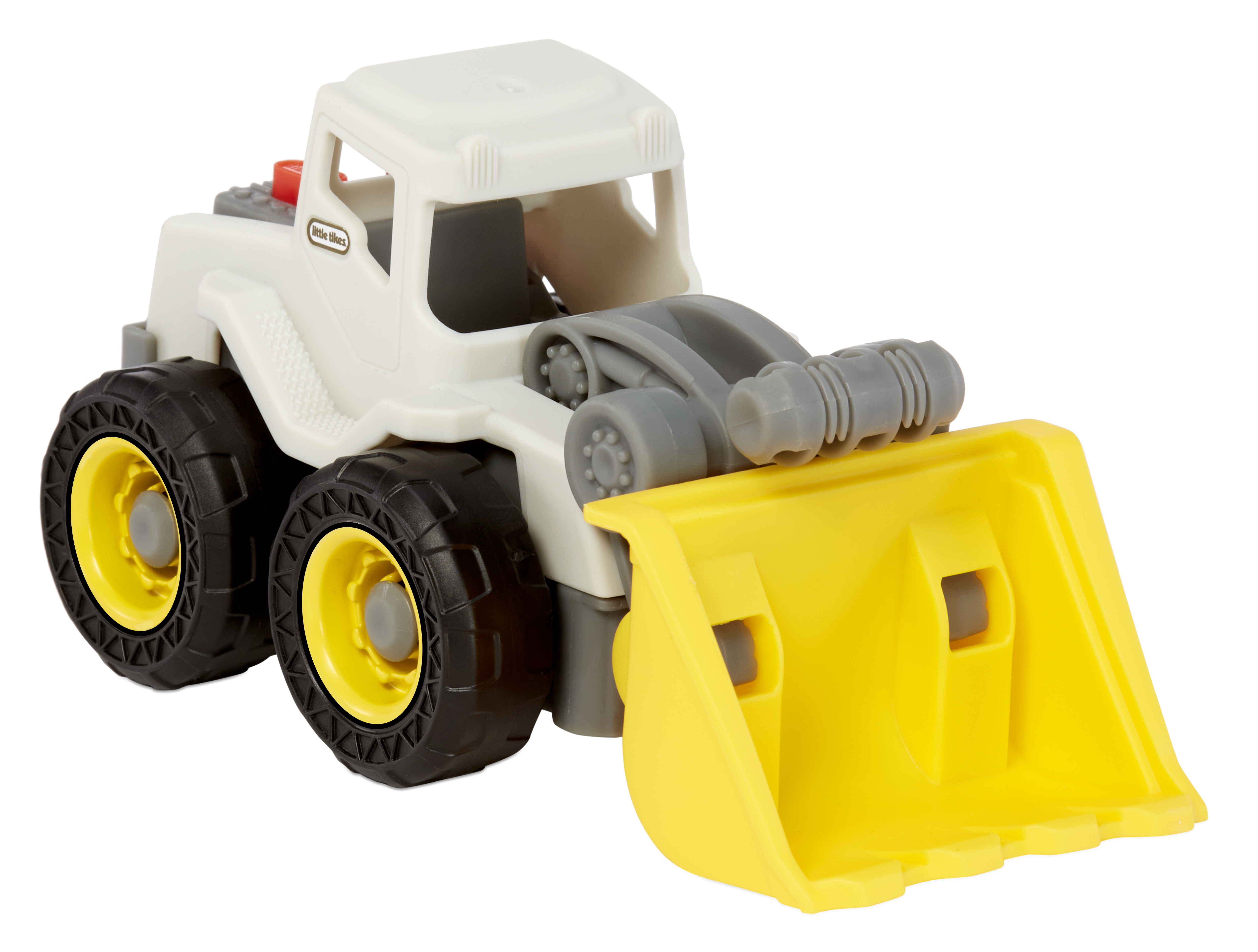 Ein weißer und grauer Spielzeug-Bulldozer mit einer gelben Schaufel und schwarzen Rädern, auf weißem Hintergrund.