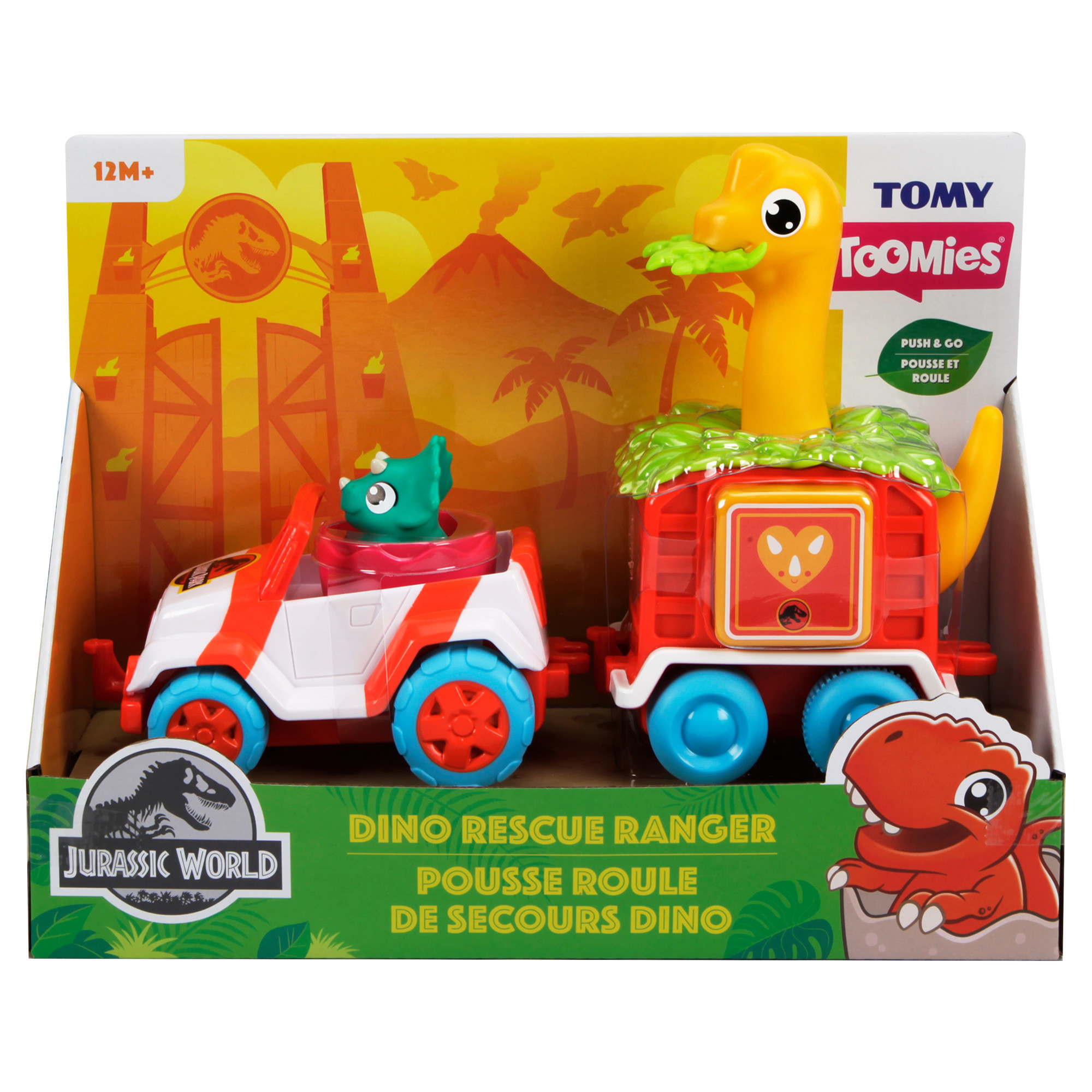 Pudełko z zabawkami z motywem Jurassic World. Pokazuje zabawkę-samochód i wózek przewożący dinozaura.