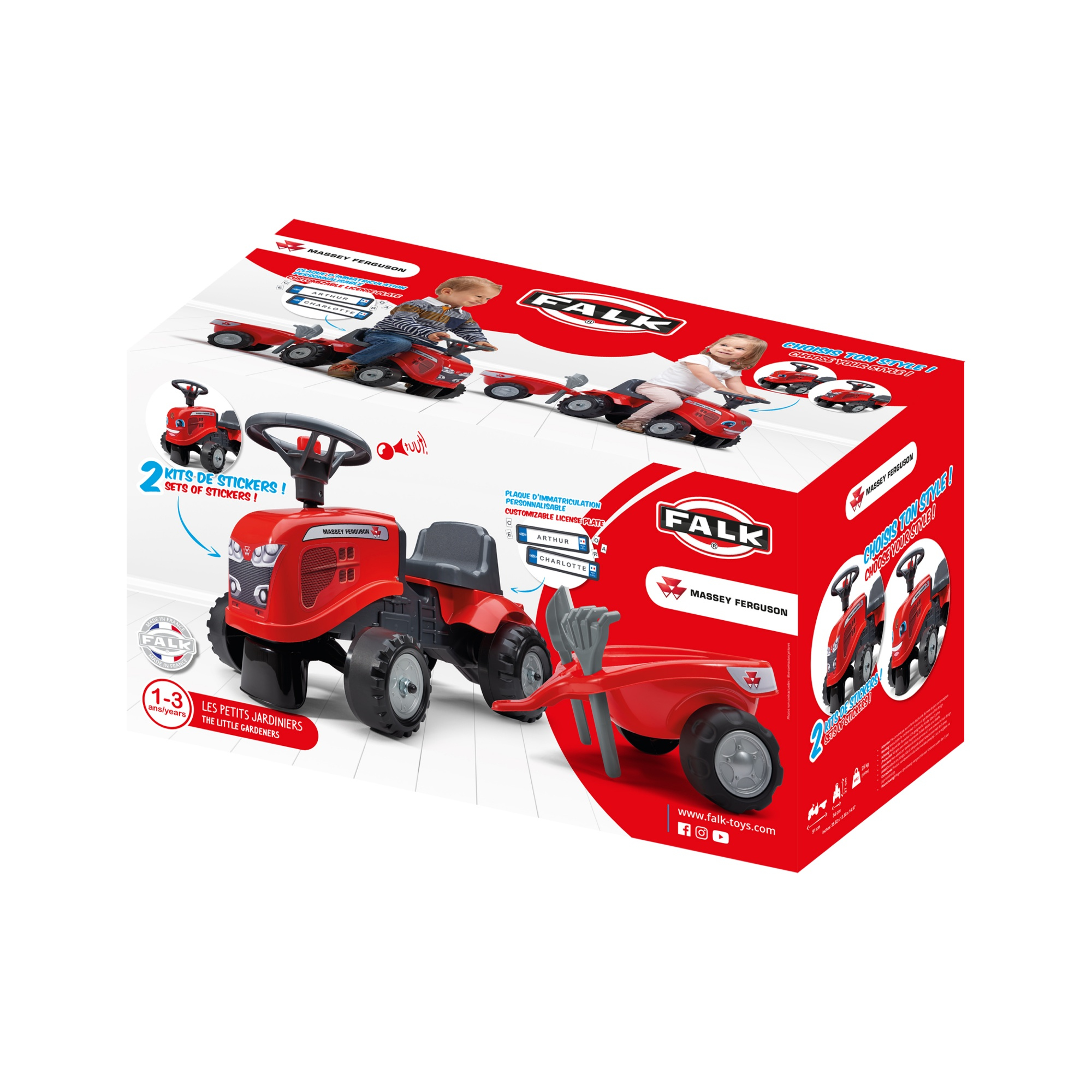 Un tractor de juguete rojo con una caja que muestra a niños jugando con tractores de juguete similares.