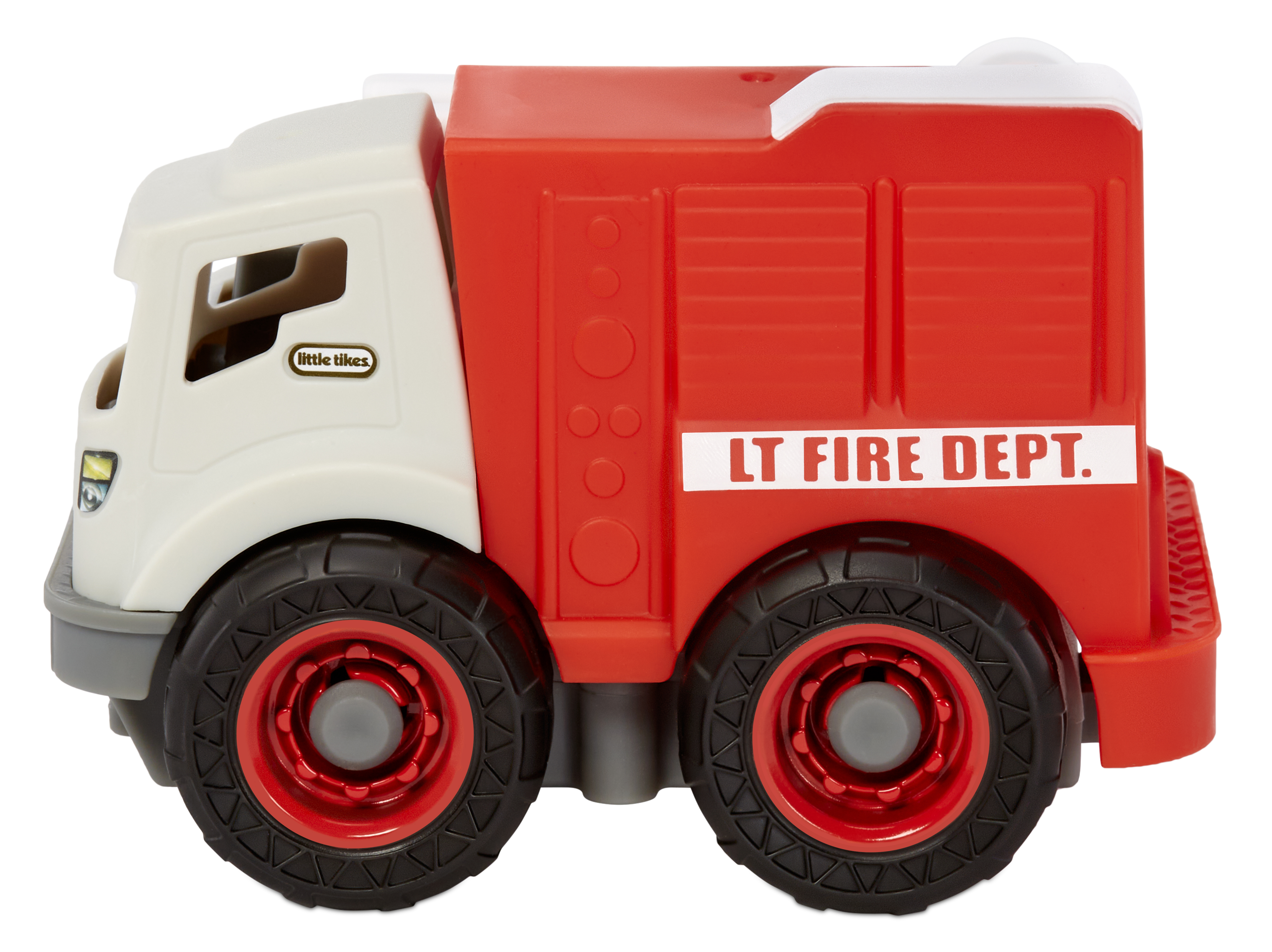 Ein Little Tikes Feuerwehrauto-Spielzeug. Es ist rot und weiß und hat die Aufschrift 'LT FIRE DEPT'.