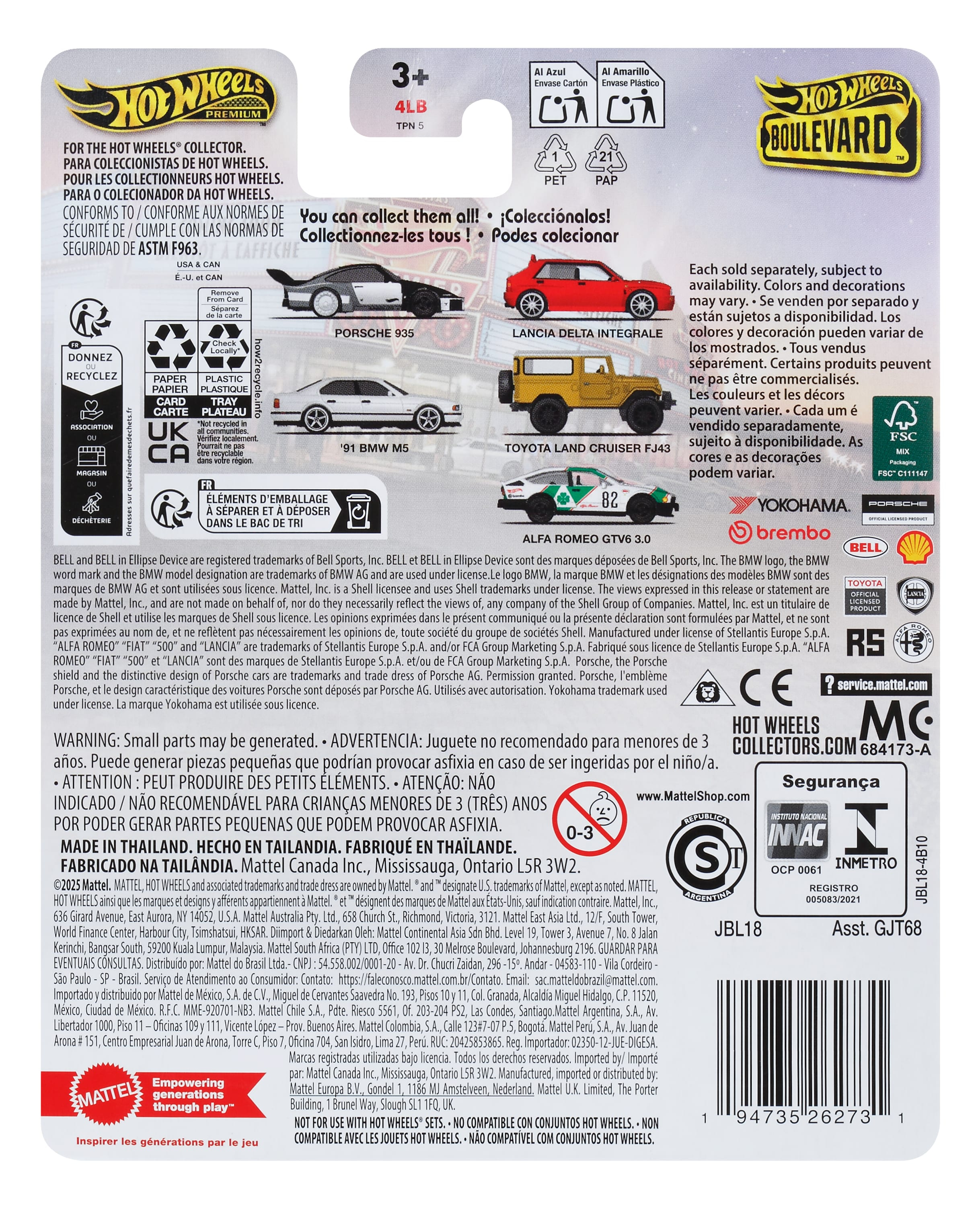 Tył opakowania Hot Wheels z kilkoma zdjęciami samochodzików, tekstem i ostrzeżeniami dotyczącymi bezpieczeństwa. Białe tło.