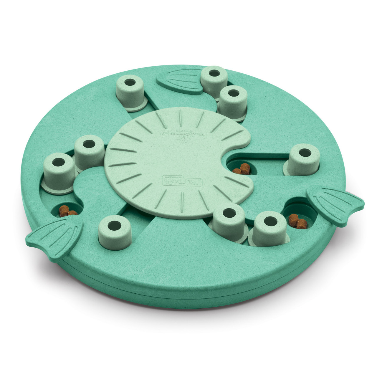 Turkusowa zabawka dla psa. Ma wiele otworów na smakołyki i obracaną pokrywę pośrodku.