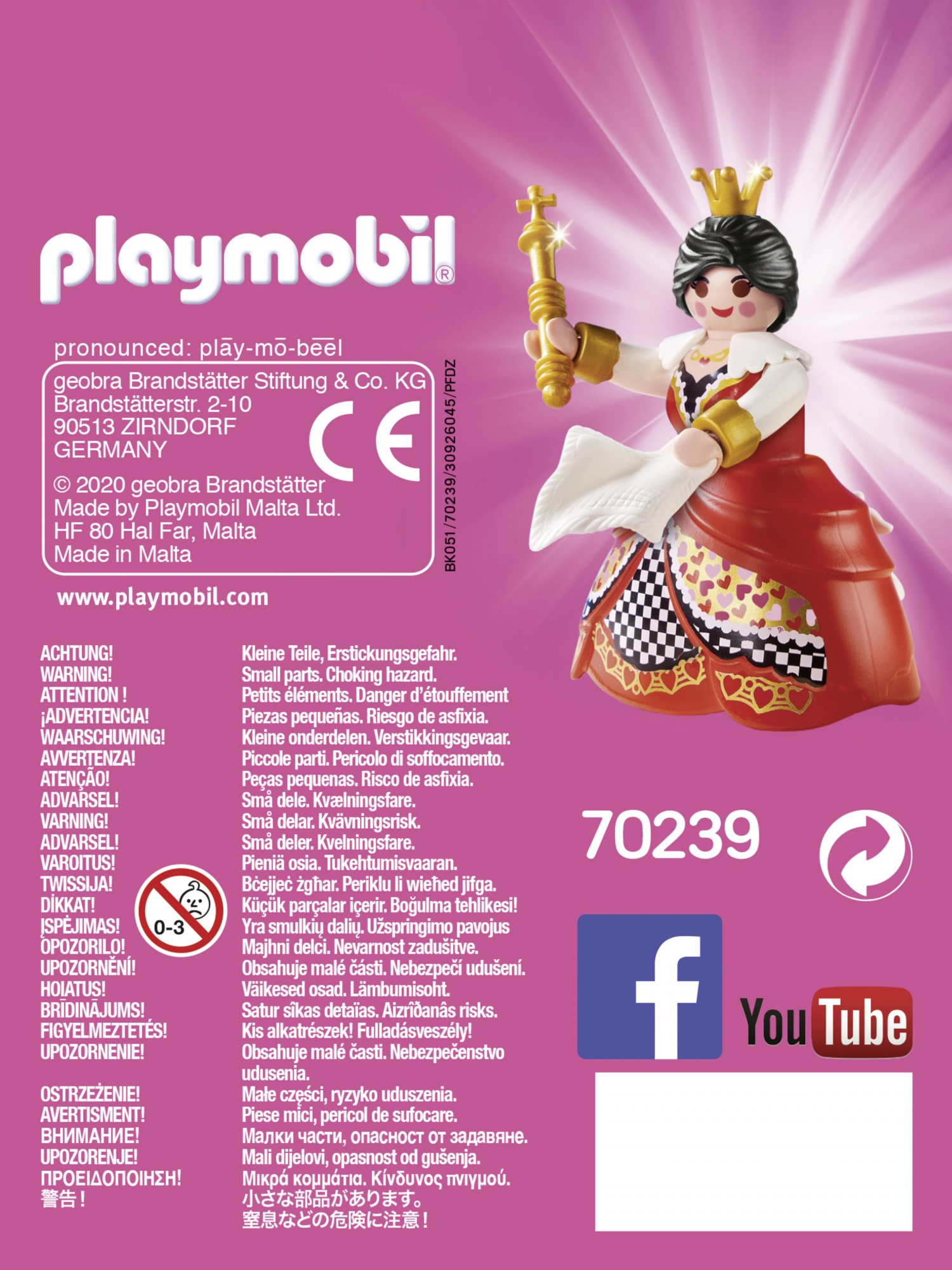 Una figura giocattolo Playmobil di una regina con corona, scettro e abito rosso e bianco, su una confezione.
