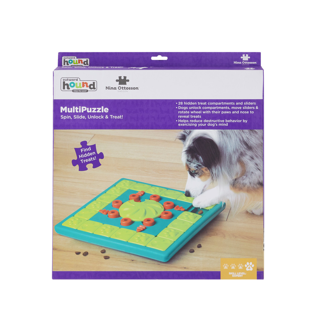 Caja de juego de rompecabezas para perros con un perro en la caja. Rompecabezas turquesa y naranja.