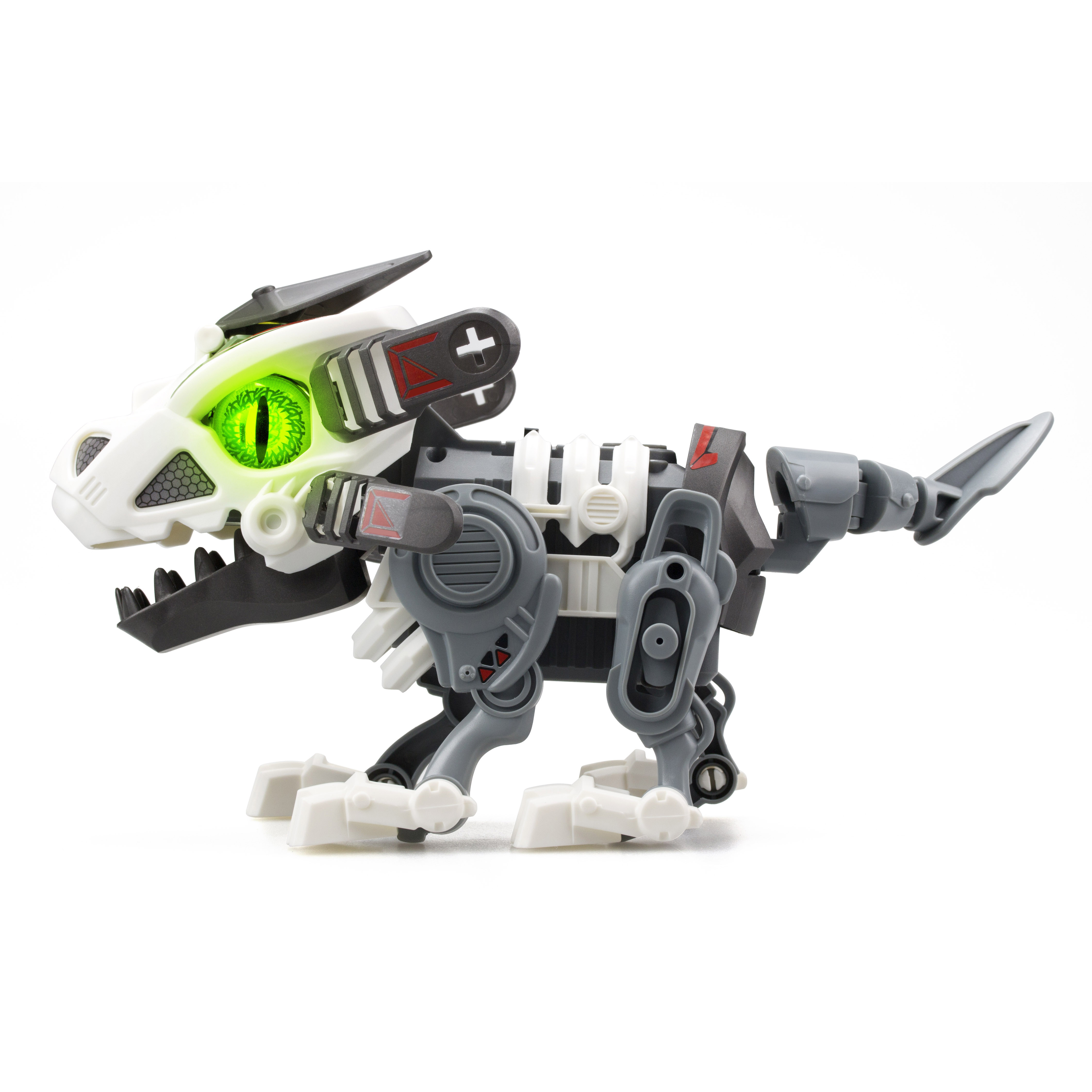Biała i szara zabawka robota dinozaura ze świecącymi zielonymi oczami, otwartą paszczą i mechanicznymi detalami.