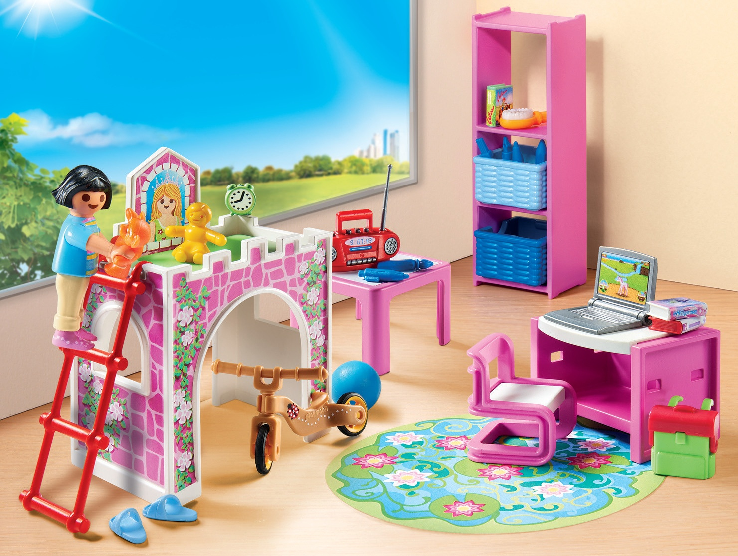 Playmobil-Set mit Mädchen, Spielzeug und rosa Burg, vor einer Raumeinstellung.