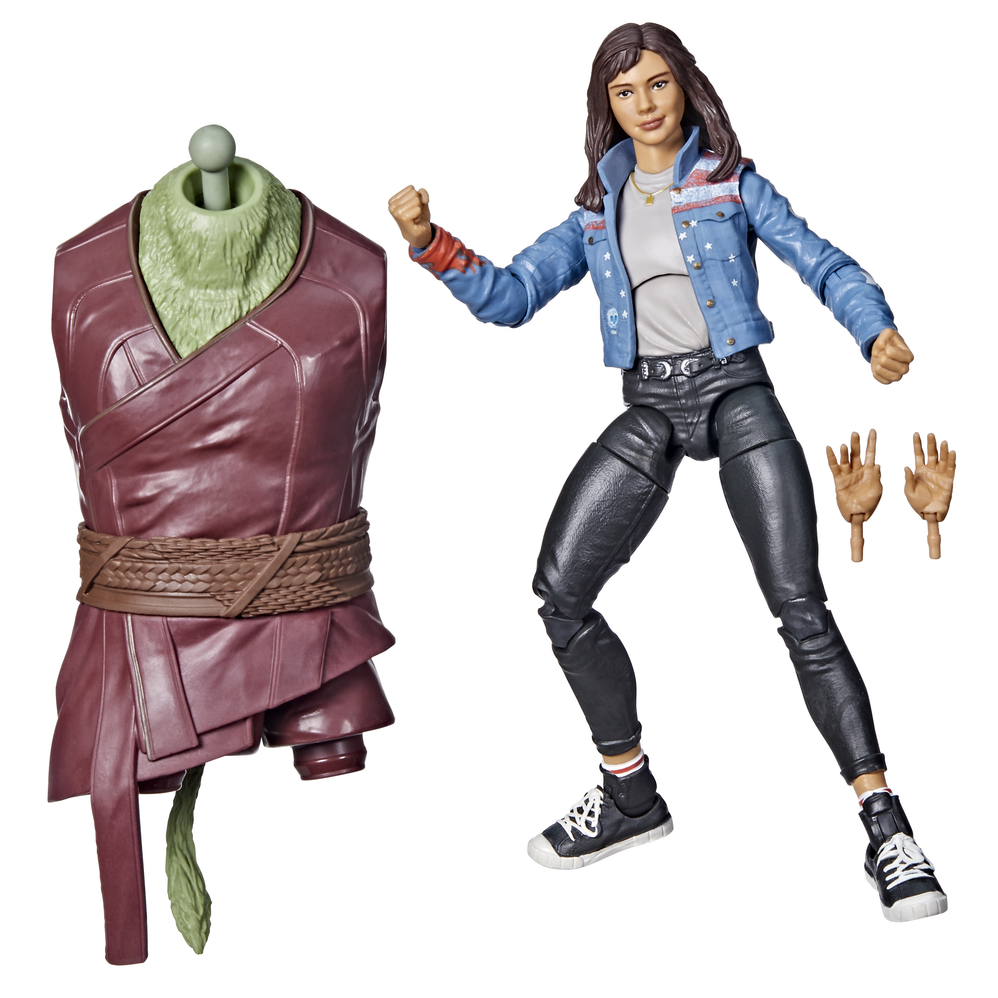 Figura de acción de una mujer con chaqueta vaquera, pantalón negro y zapatos blancos. Una figura verde.