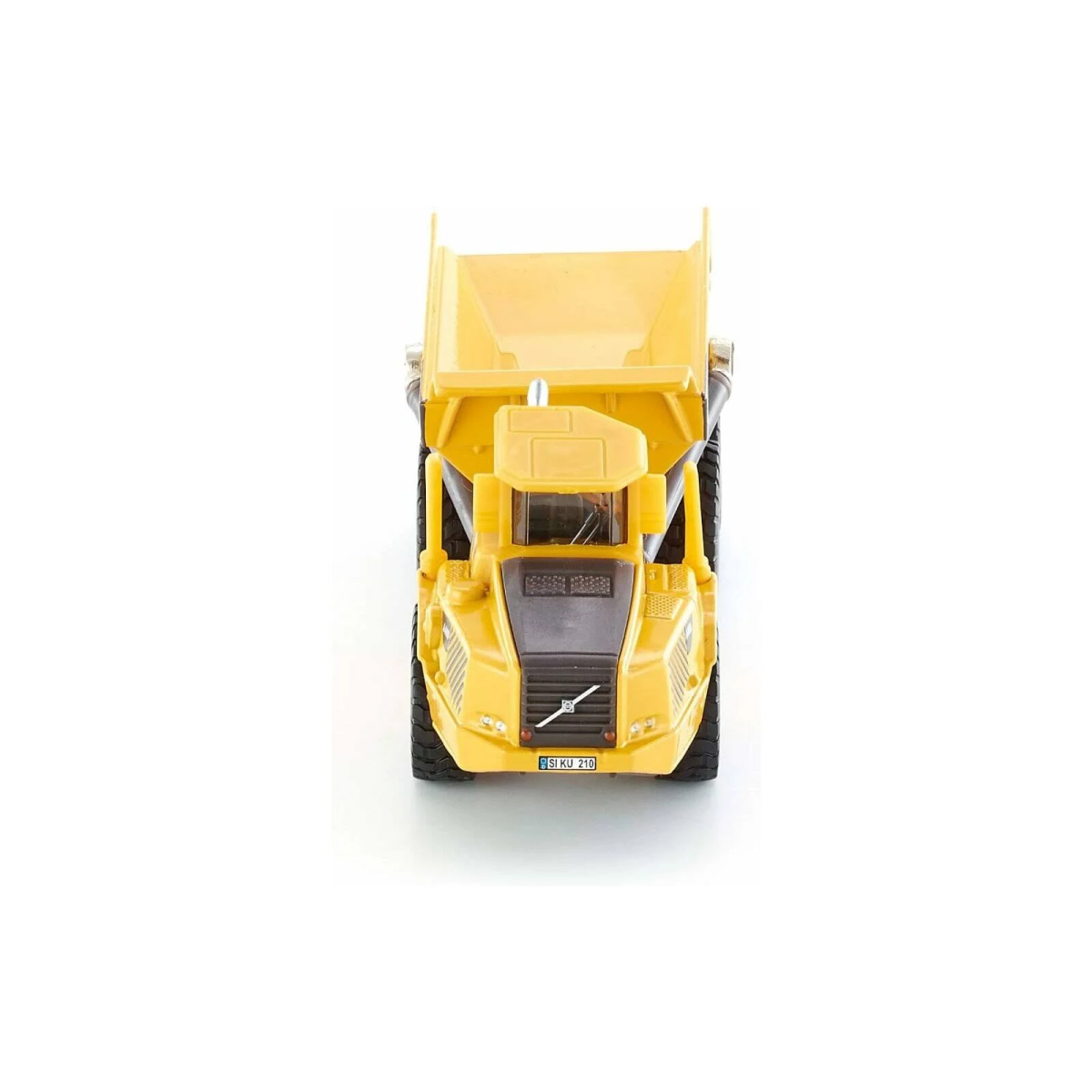 Ein gelbes Muldenkipper-Spielzeug steht auf einer weißen Oberfläche. Der LKW hat eine schwarze Front.