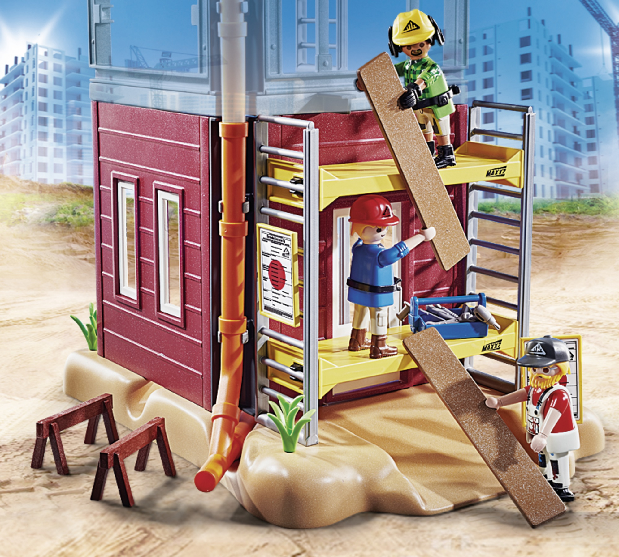 Zestaw do zabawy na budowie. Trzy figurki budują konstrukcję z desek i narzędzi.