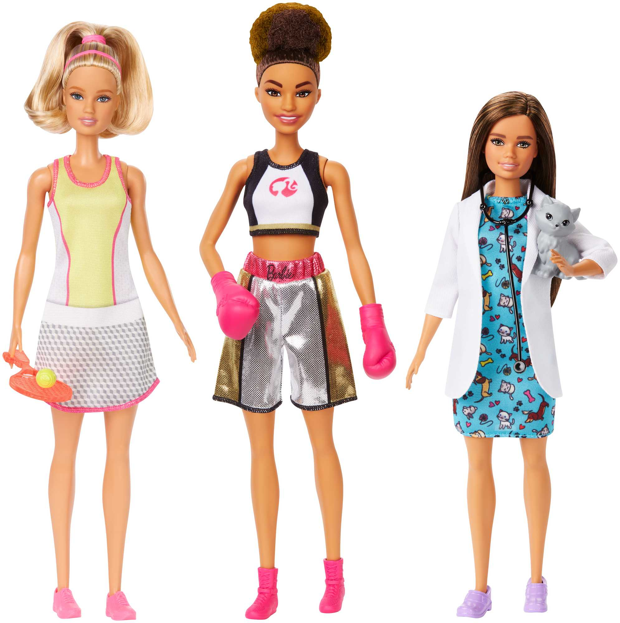 Drei Barbie-Puppen, die als Tennisspielerin, Boxer und Tierärztin mit Katze gekleidet sind.