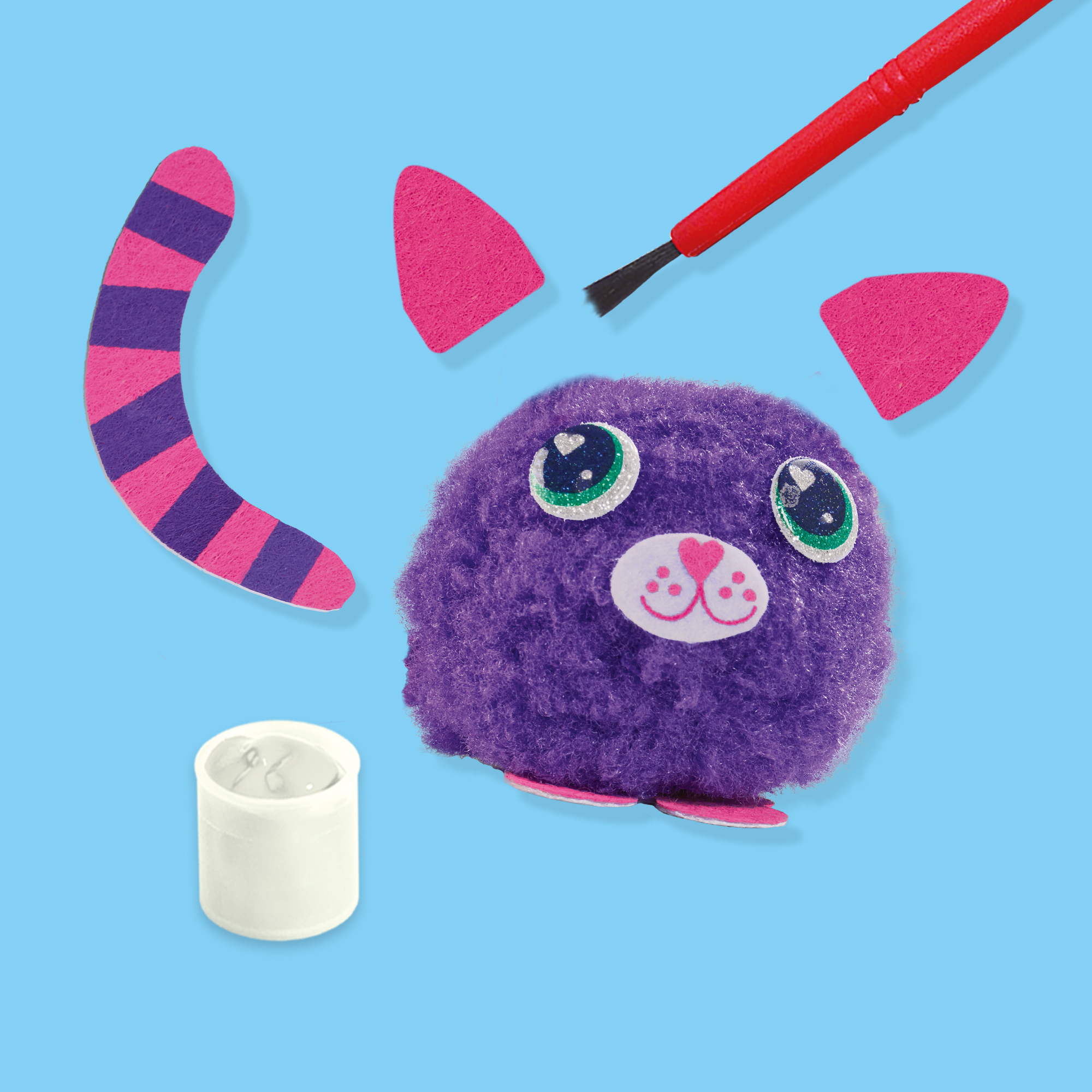 Elementy zestawu rzemieślniczego: fioletowy pompon, różowe kawałki filcu, klej i pędzel.