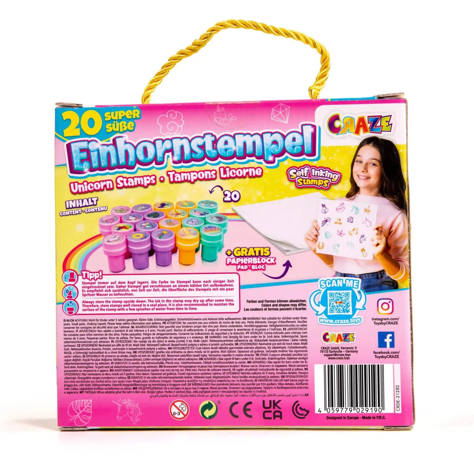 Pudełko ze stemplami z jednorożcami, dziewczyna trzymająca rysunek i złoty uchwyt. Różowe i fioletowe kolory.