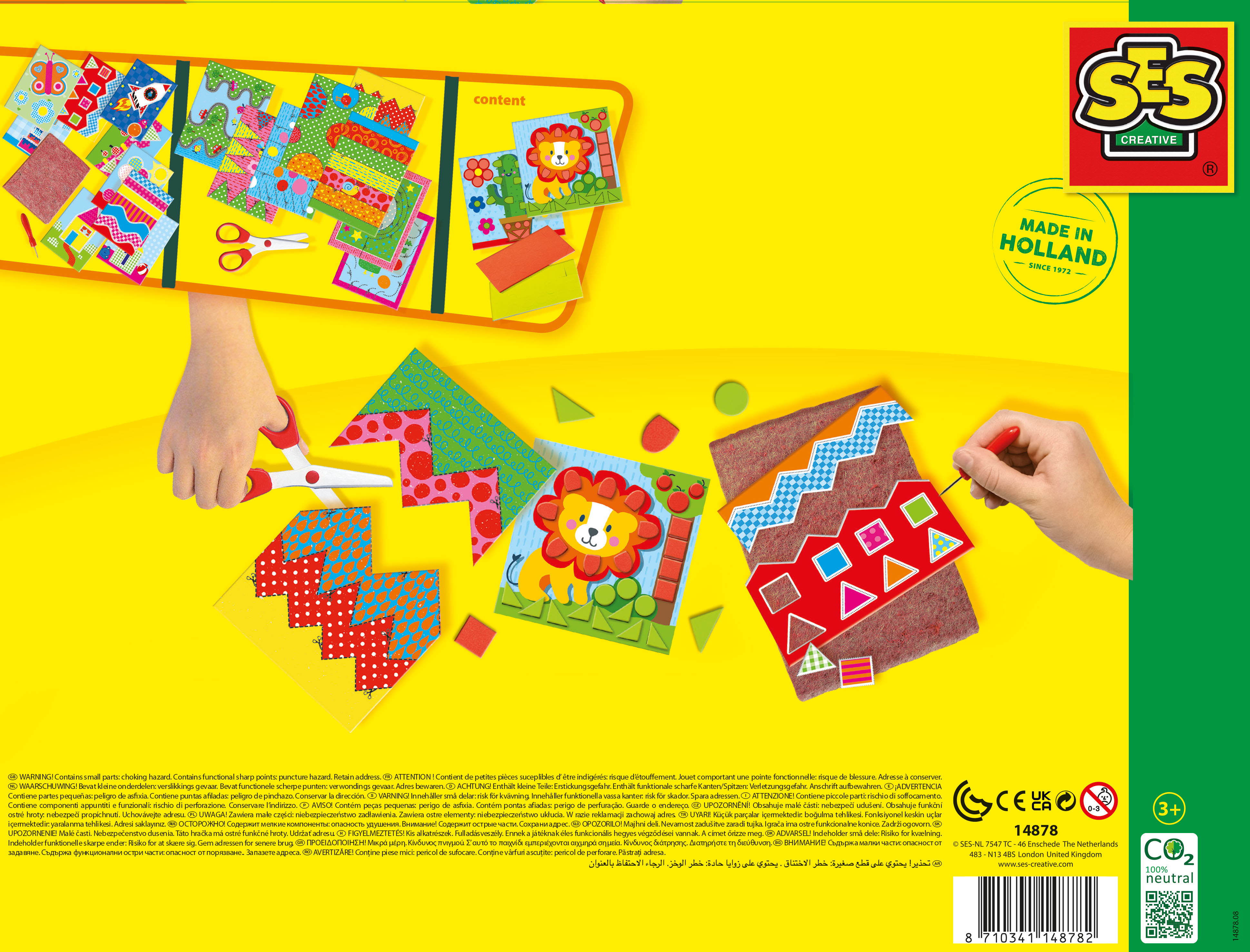 Zestaw rzemieślniczy z kształtami, nożyczkami i igłą. Pokazuje lwa na kartce.