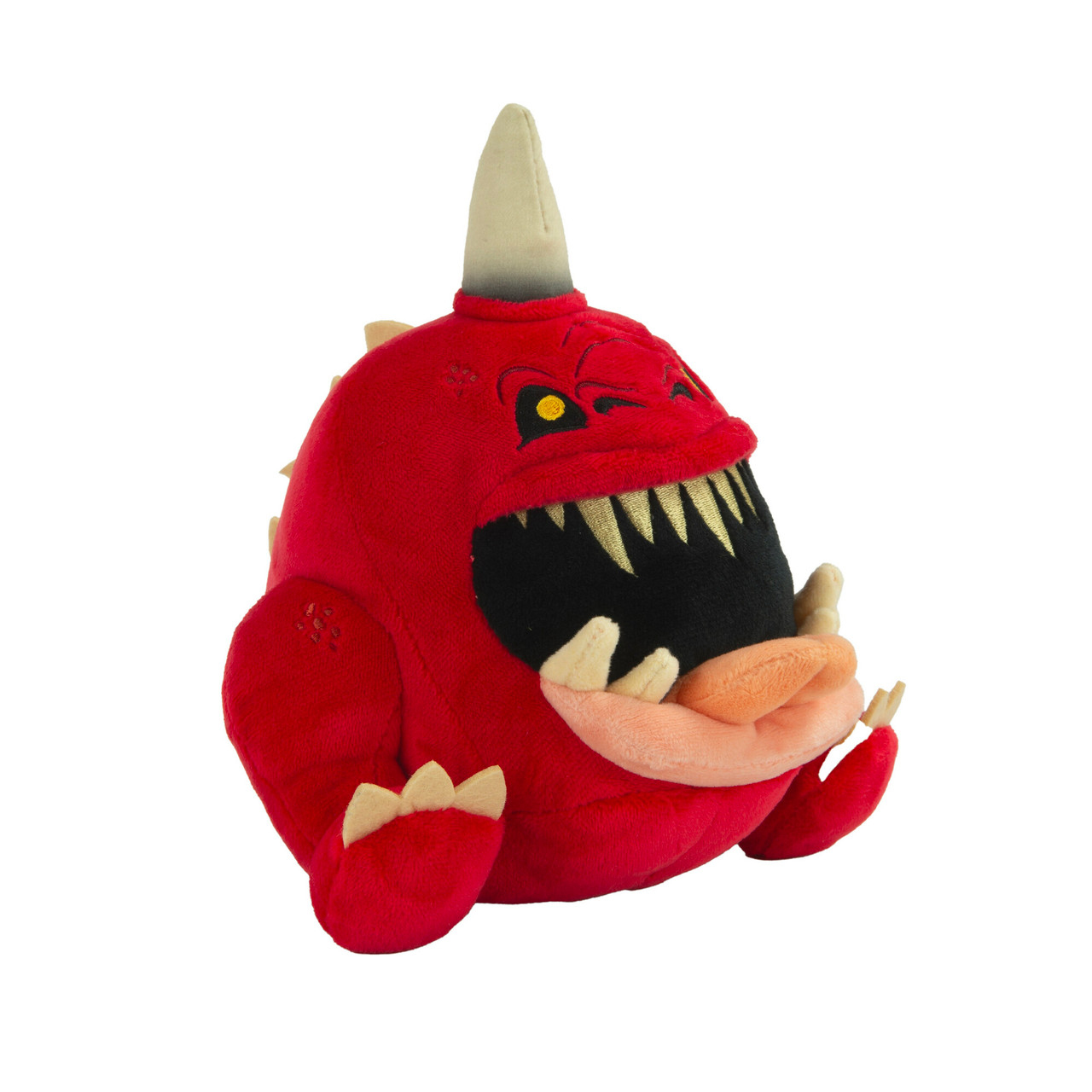 Peluche monstre rouge avec corne et grande bouche avec dents.