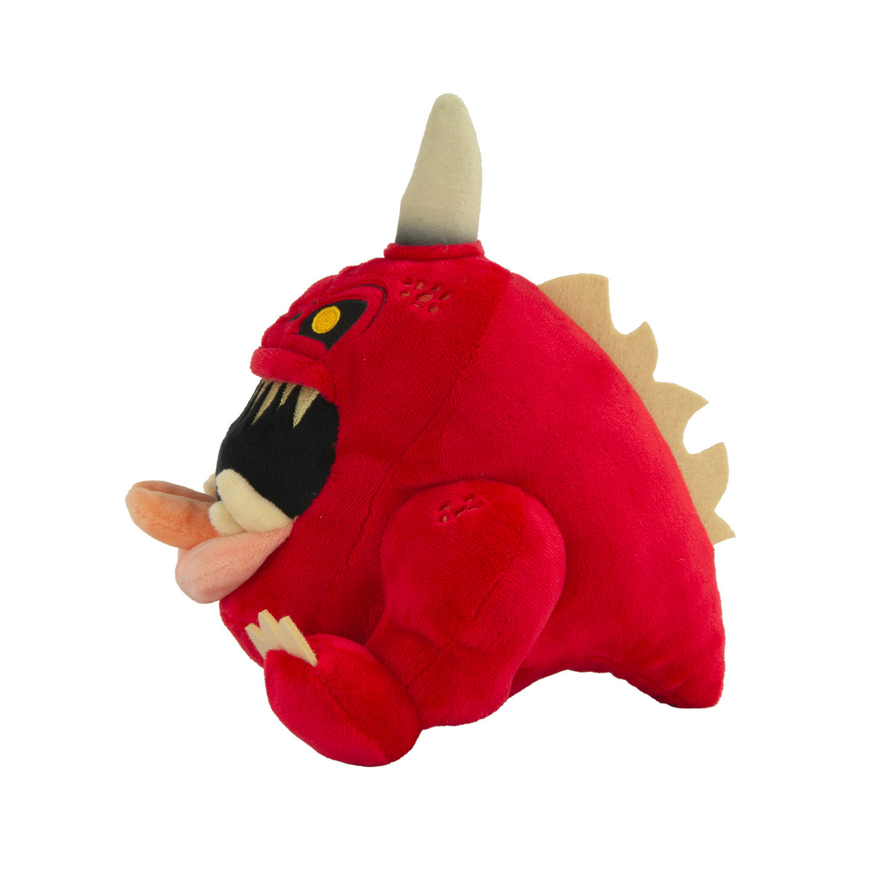 Jouet monstre en peluche rouge avec une corne. Fond blanc.