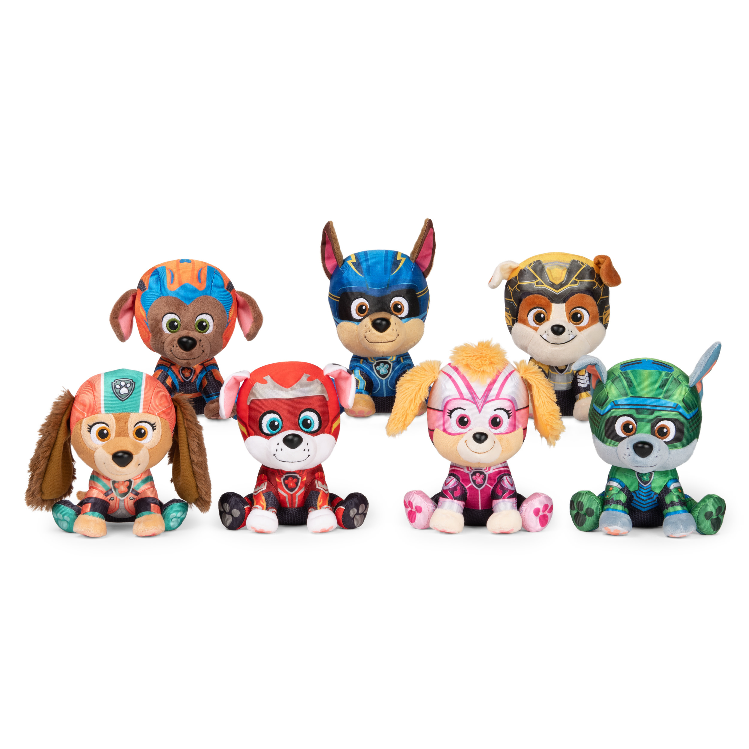 Un grupo de siete peluches de Paw Patrol. Cada perro lleva un disfraz de superhéroe. Están sobre una superficie blanca.