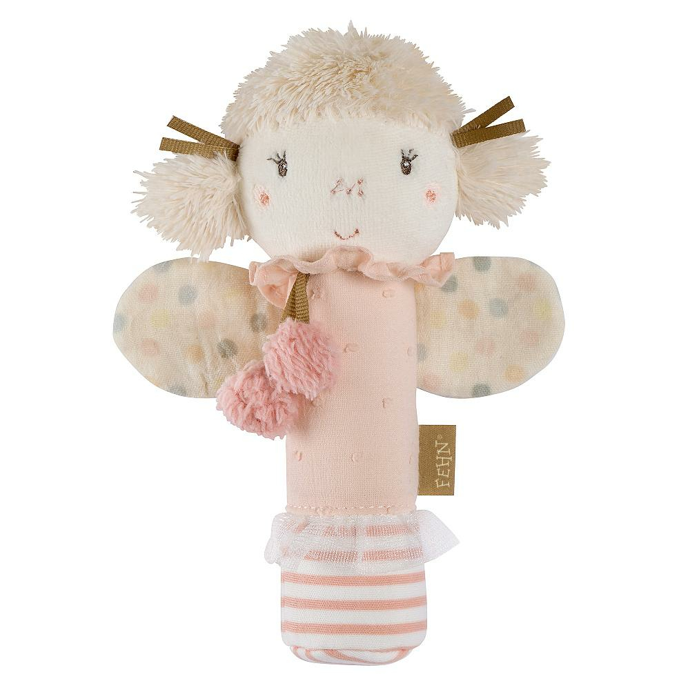 Un peluche a forma di angelo rosa e bianco con pompon rosa. Ha una testa soffice e sorride.