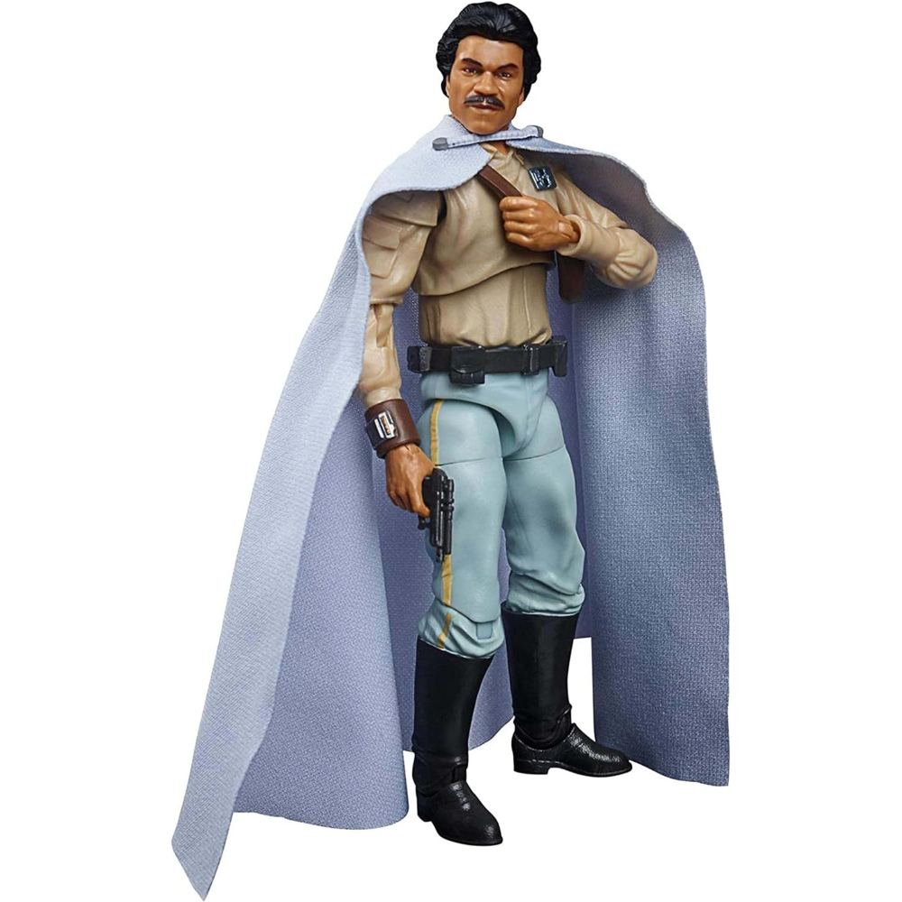 Una action figure di Lando Calrissian di Star Wars, che tiene una pistola, indossa un mantello ed è in piedi.