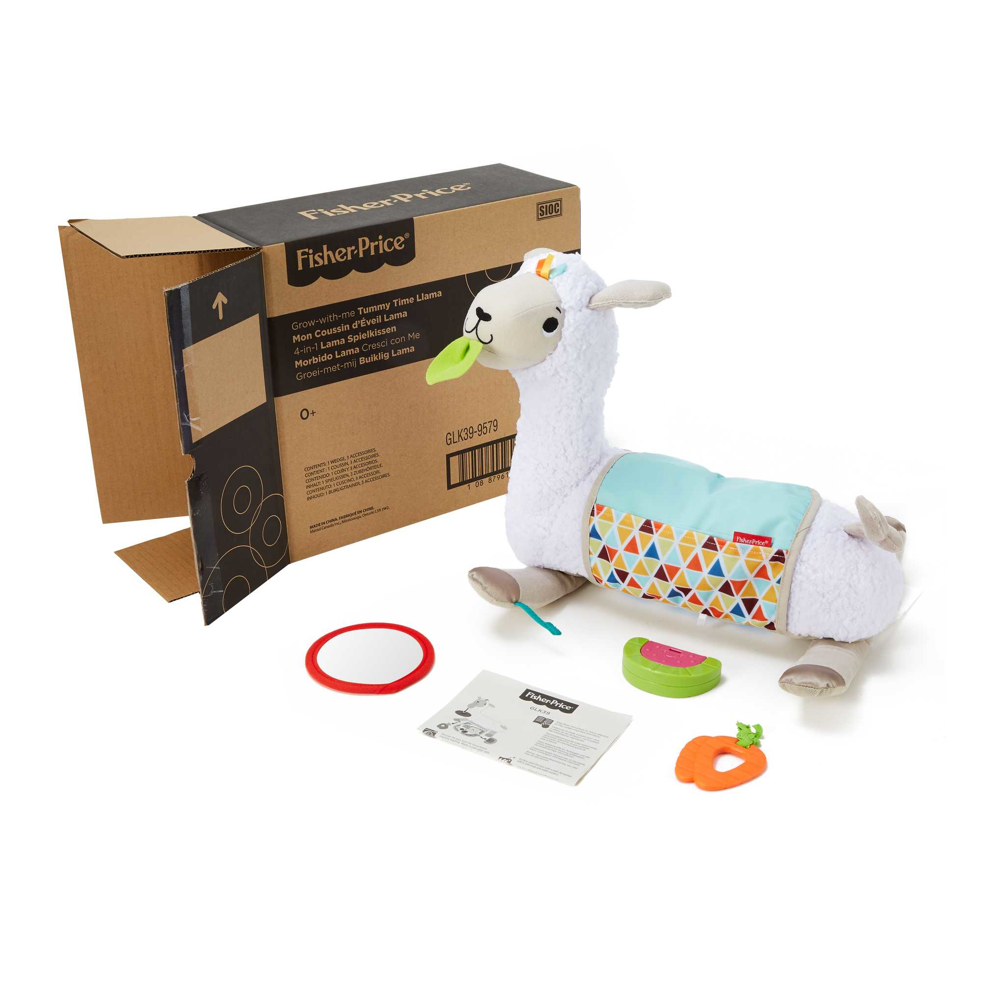 Zabawka lamy z akcesoriami, kartonowe pudełko w tle, w tym lustro, marchewka i instrukcje.