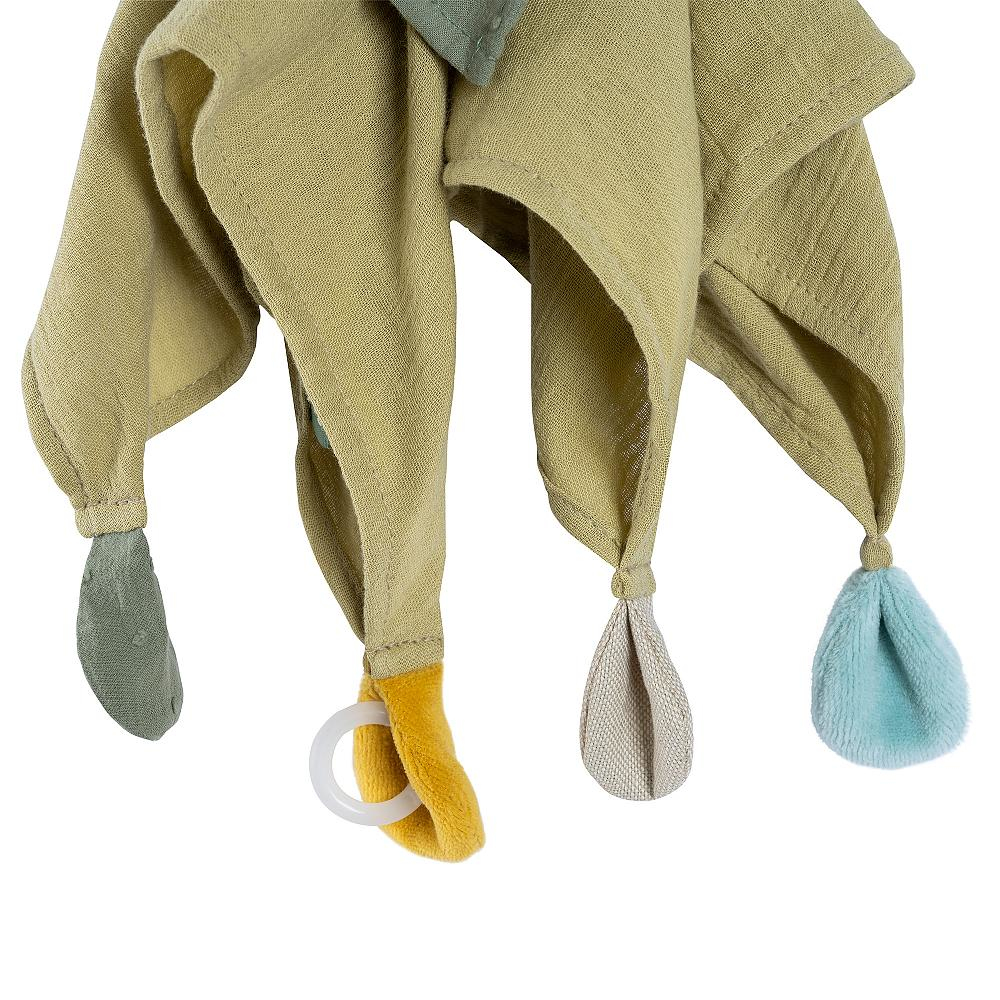 Zbliżenie zabawki dla dziecka, tkaniny z kolorowymi załącznikami i pierścieniem.