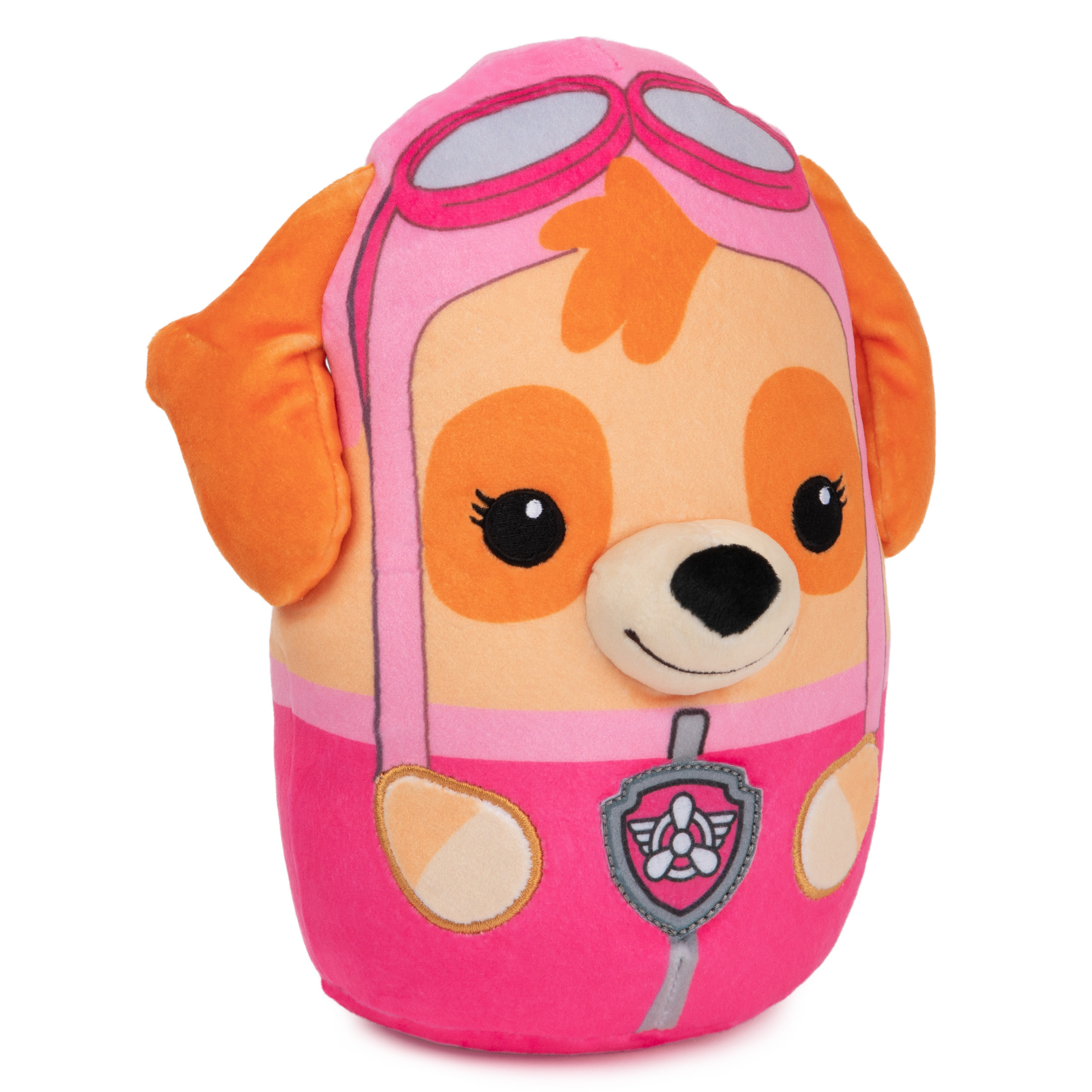 Peluche rosa di Skye di Paw Patrol, con orecchie arancioni, occhiali e tuta rosa.