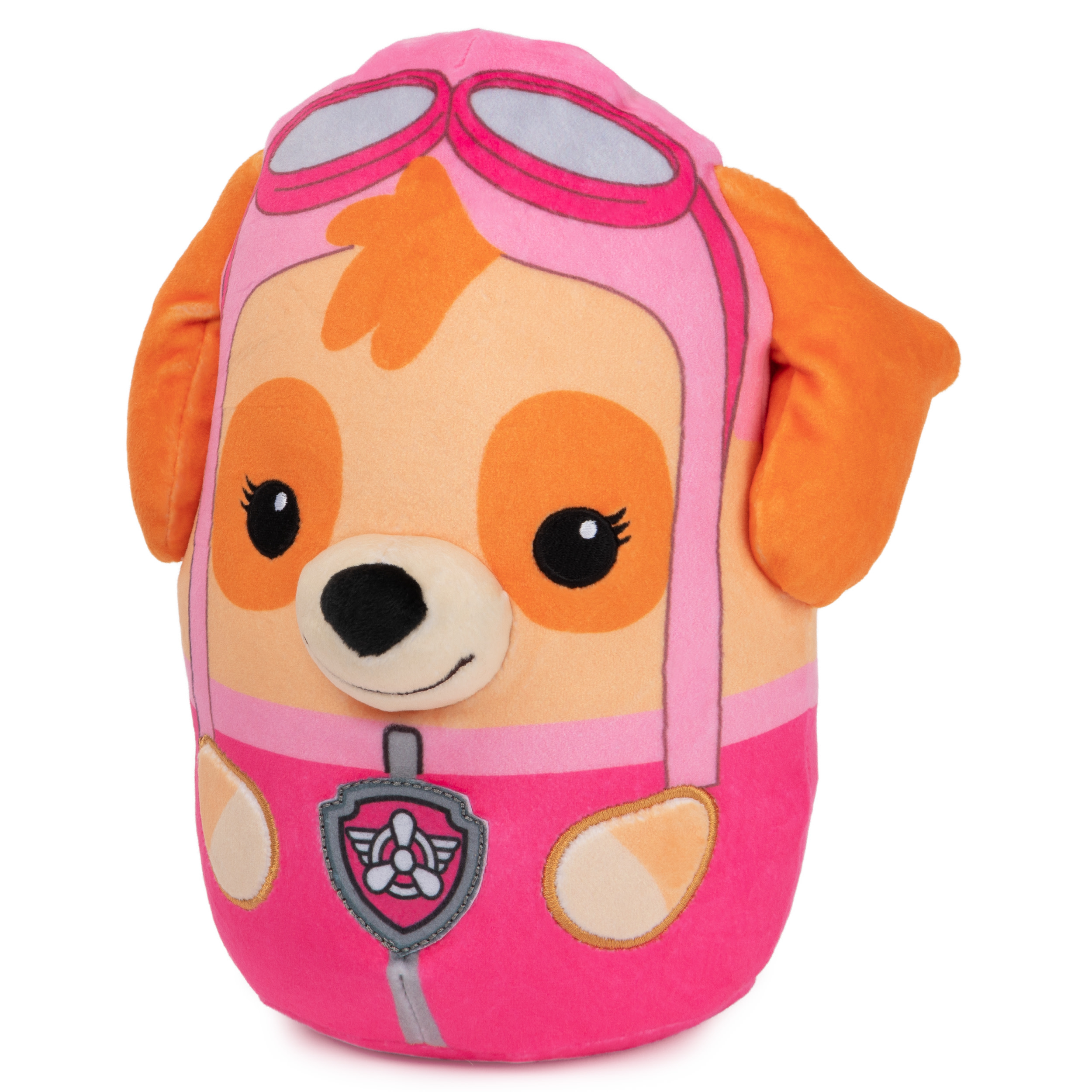 Un peluche a forma di cucciolo di PAW Patrol, con un casco da aviatore rosa e occhiali.