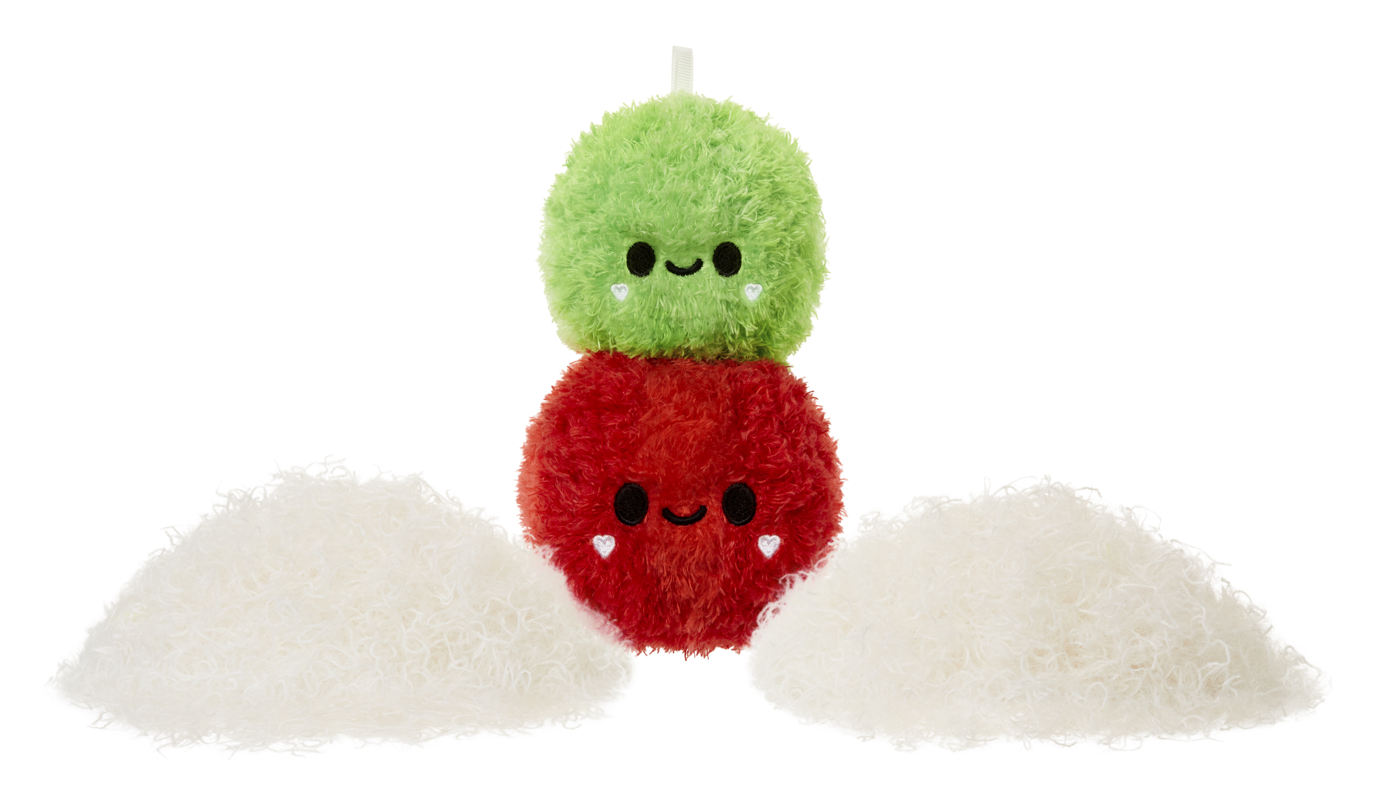 Dwupoziomowa pluszowa zabawka z zieloną górą i czerwoną dolną częścią oraz dwoma stosami puchu.