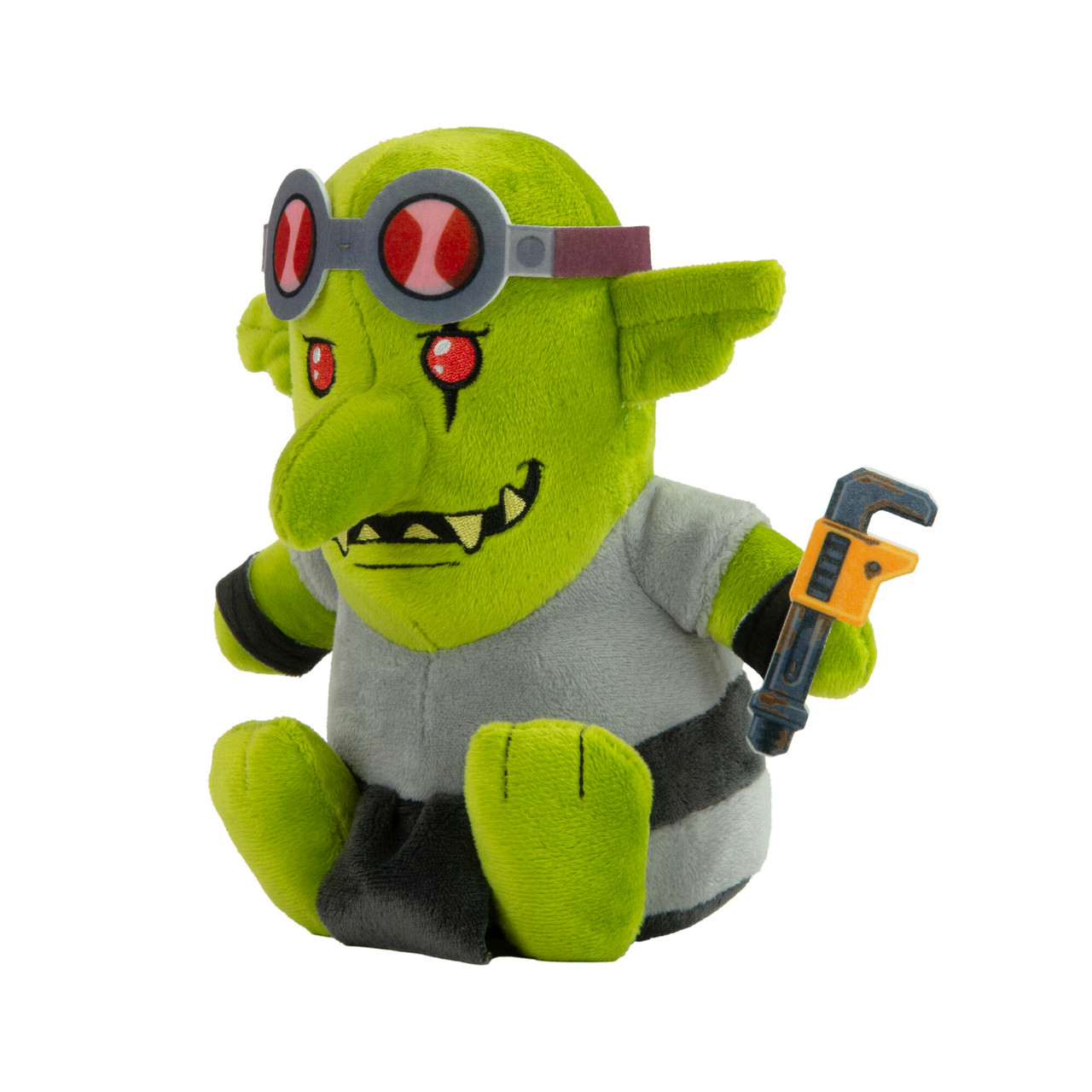 Peluche di goblin verde con occhiali e camicia grigia, che tiene una chiave inglese. Lo sfondo è bianco.