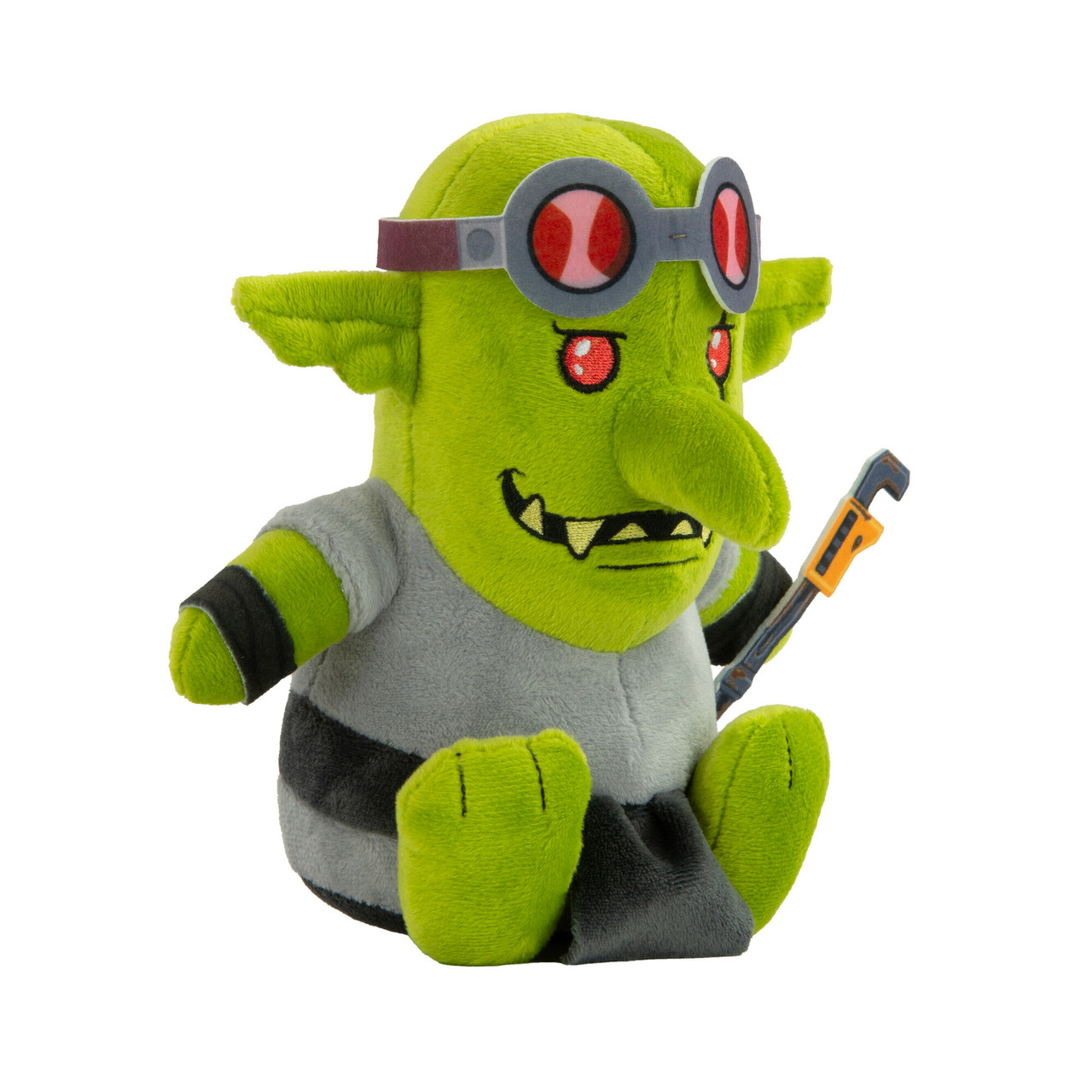 Peluche di goblin verde con occhiali e camicia grigia, che tiene una chiave inglese. Lo sfondo è bianco.