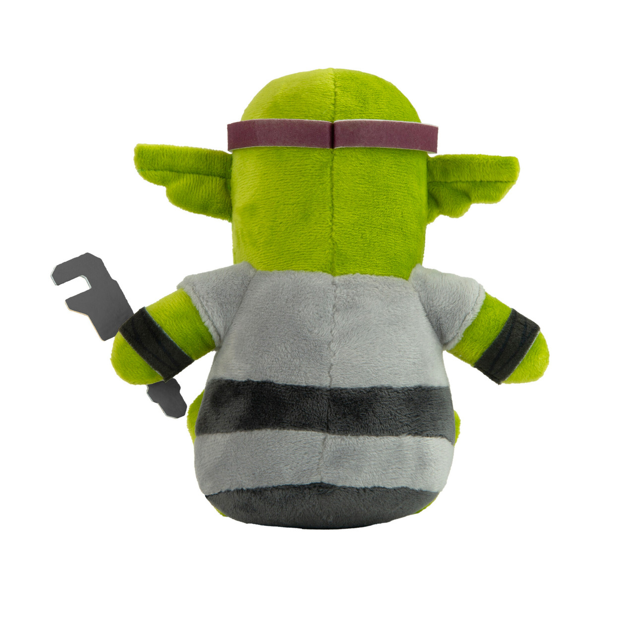 Peluche di goblin verde con occhiali e camicia grigia, che tiene una chiave inglese. Lo sfondo è bianco.