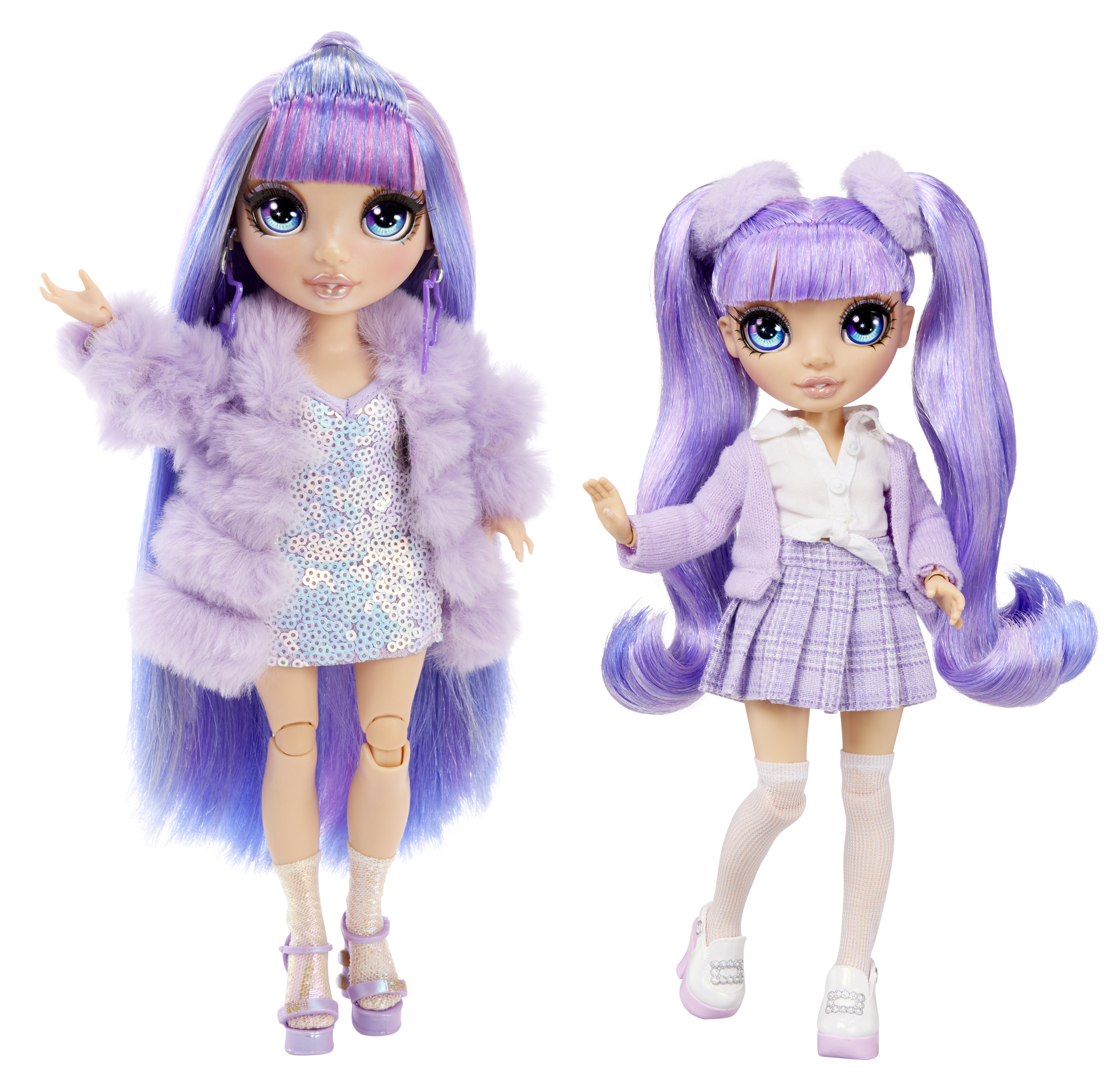 Dwie lalki z fioletowymi włosami, jedna w futrze, druga w spódnicy i swetrze.