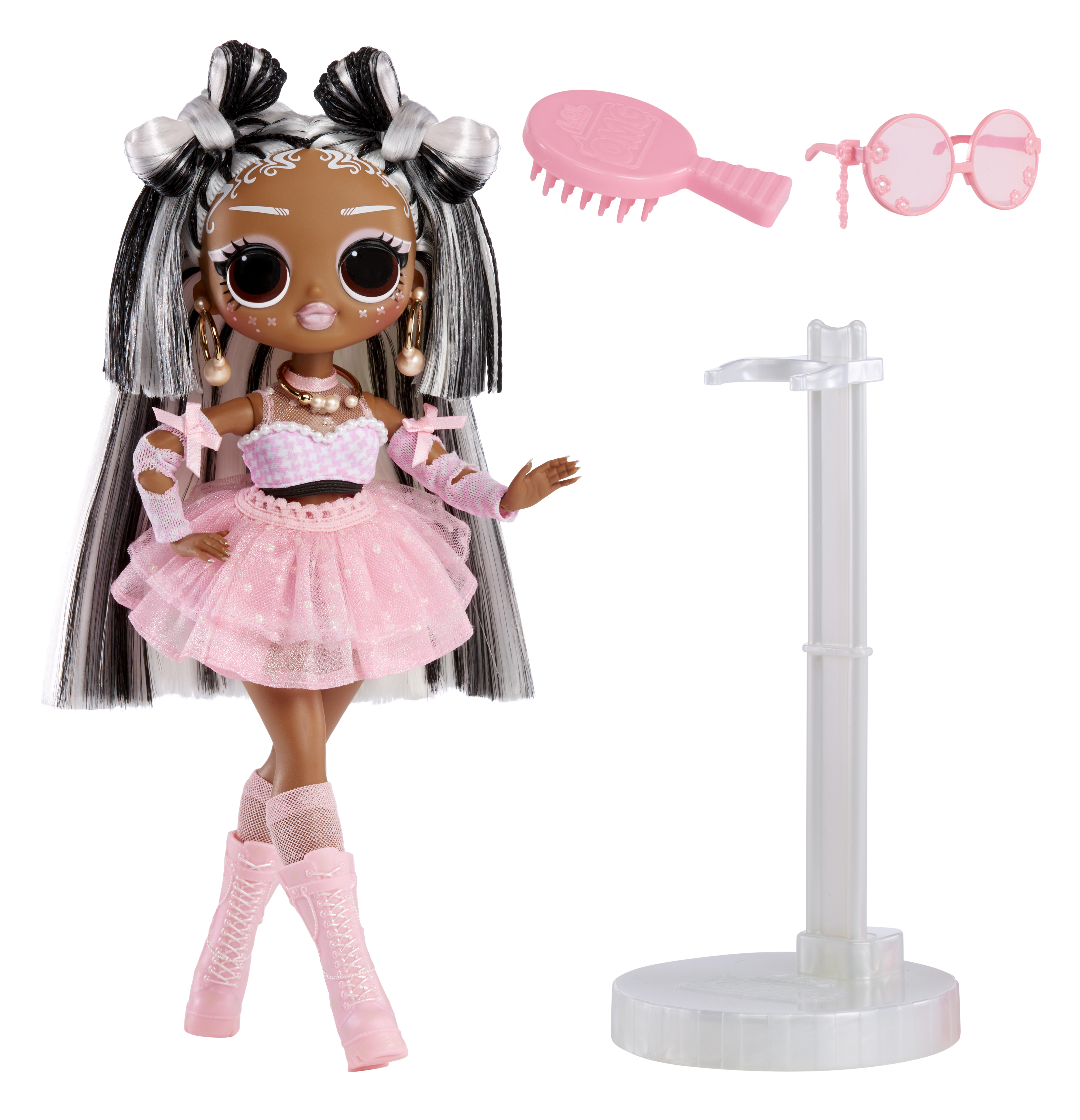 Lalka modowa z różowymi akcesoriami, stojakiem i grzebieniem.